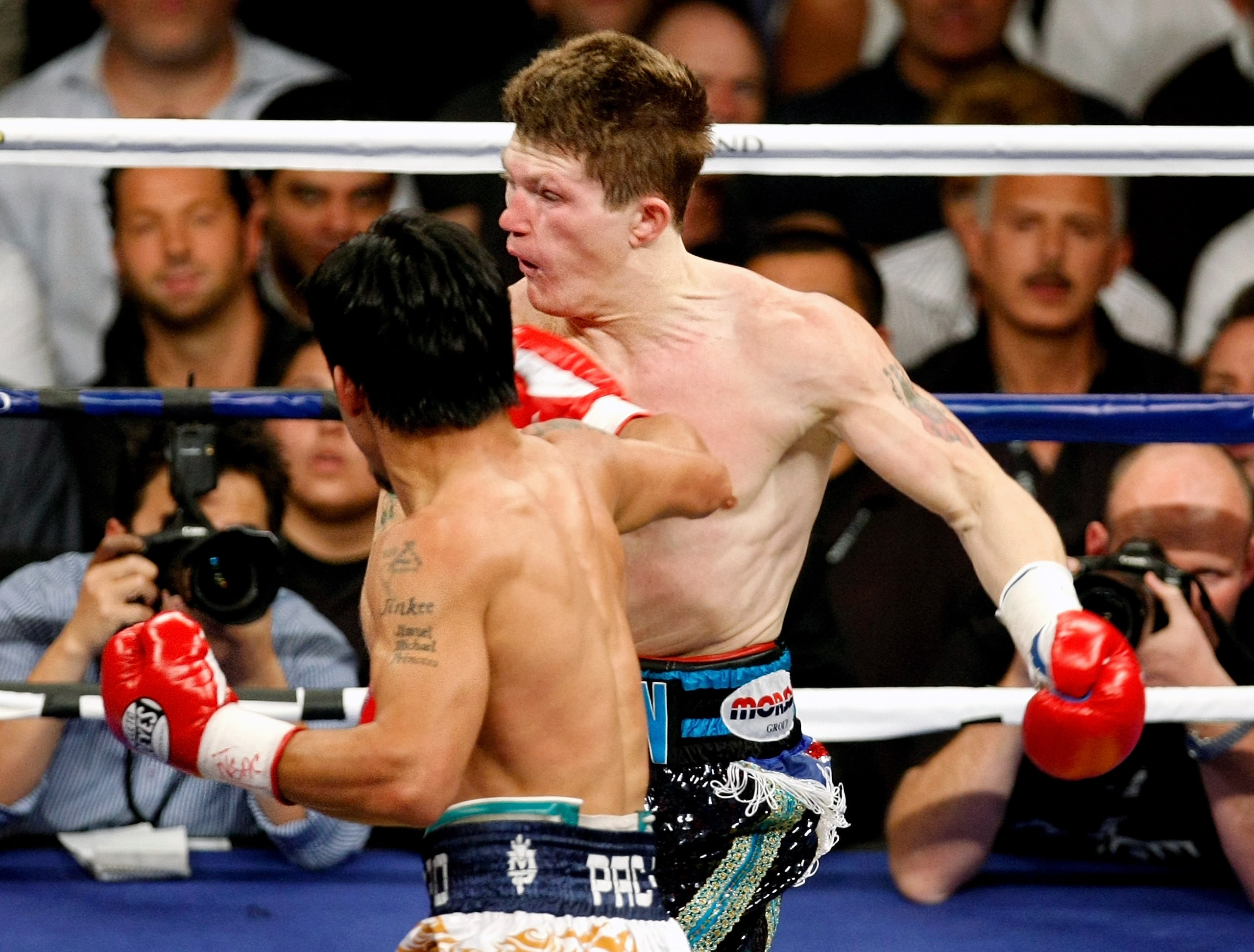 LAS VEGAS - MAY 02:  Manny Pacquiao of the Philippines hits Ricky Hatton of England during the first round of their junior welterweight title fight at the MGM Grand Garden Arena May 2, 2009 in Las Vegas, Nevada. Pacquiao defeated Hatton by a second round