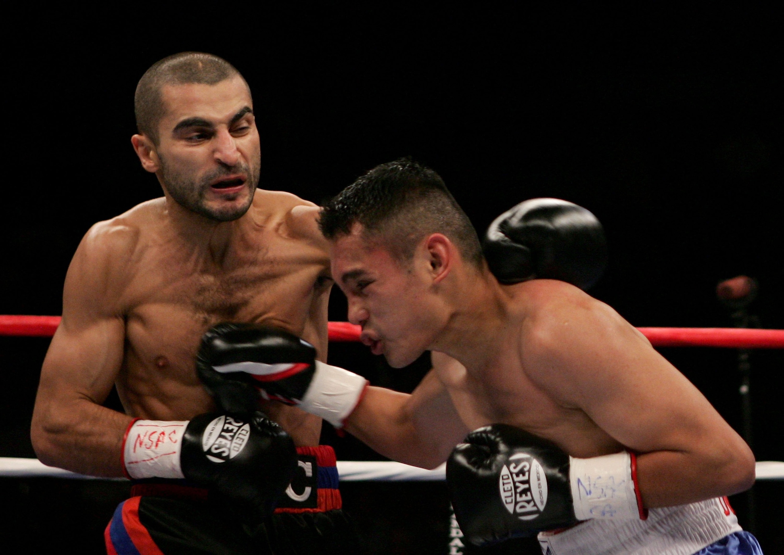 LAS VEGAS - OCTOBER 07:  Vic Darchinyan (L) fights against Glenn Donaire during the IBF/IBO Flywieght Championship bout on October 7, 2006 at the Mandalay Bay Event Center in Las Vegas, Nevada.  (Photo by Jonathan Ferrey/Getty Images)