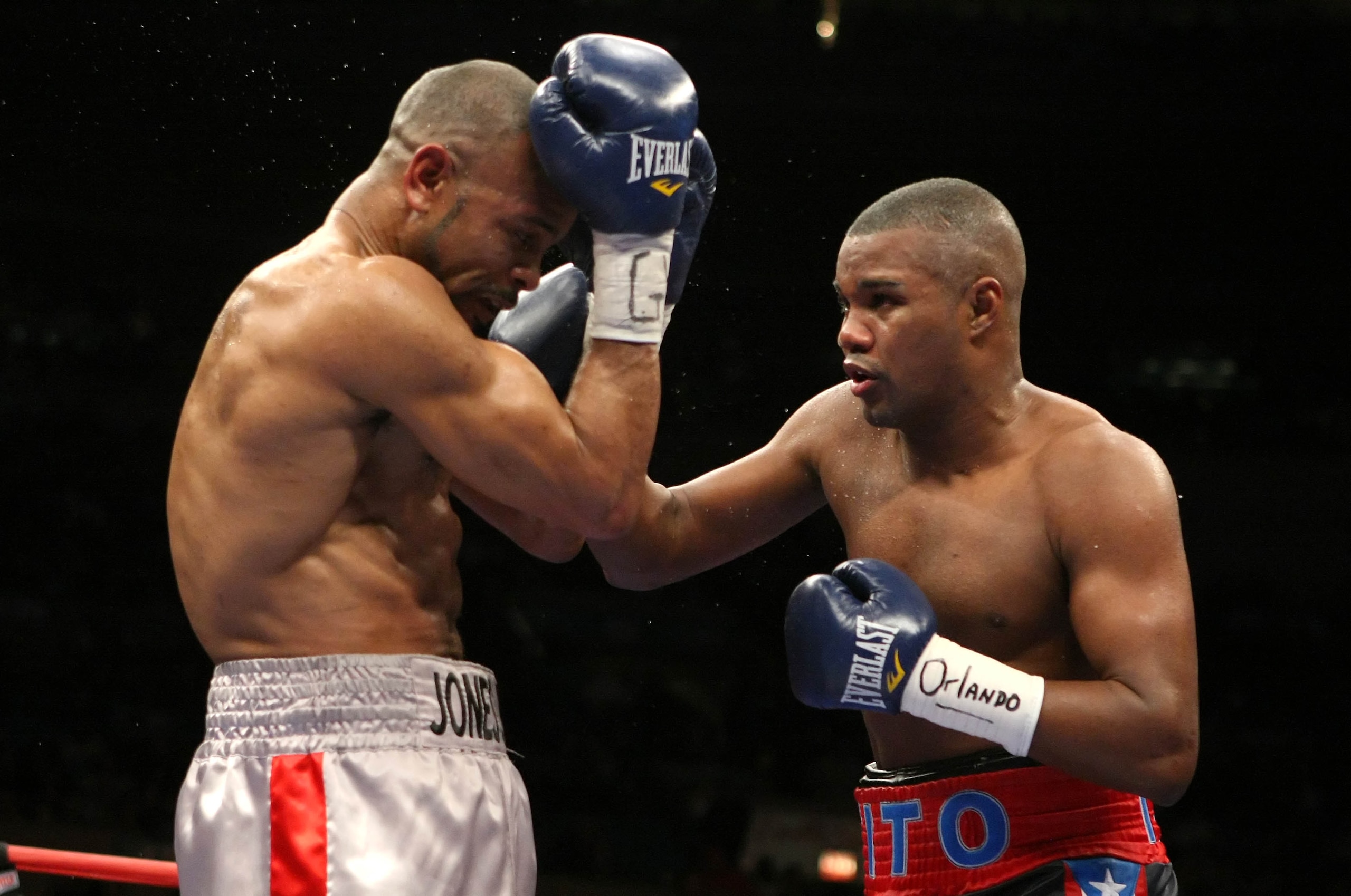 NEW YORK - JANUARY 19:  Tito Trinidad (R) lands a right hand against Roy Jones Jr. during their Light Heavyweight bout at Madison Square Garden January 19, 2008 in New York City. Roy Jones Jr. won the 12 round fight by unanimous decision  (Photo by Al Bel
