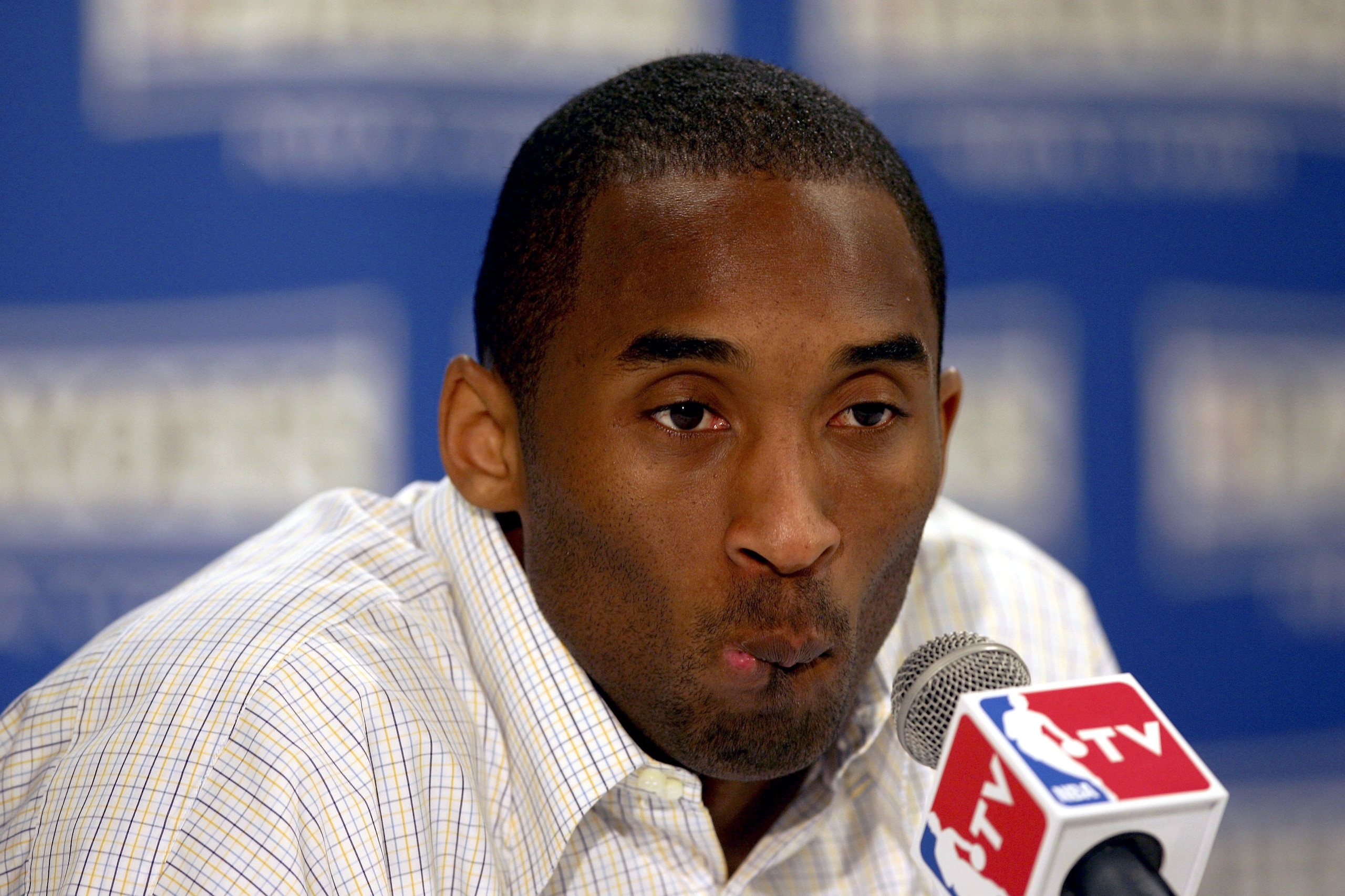 PHOENIX - MAY 6: Kobe Bryant #8 of the Los Angeles Lakers speaks to the press after game seven of the Western Conference Quarterfinals against the Phoenix Suns during the 2006 NBA Playoffs at the US Airways Center on May 6, 2006 in Phoenix, Arizona. The PHOENIX - MAY 6: Kobe Bryant #8 of the Los Angeles Lakers speaks to the press after game seven of the Western Conference Quarterfinals against the Phoenix Suns during the 2006 NBA Playoffs at the US Airways Center on May 6, 2006 in Phoenix, Arizona. The