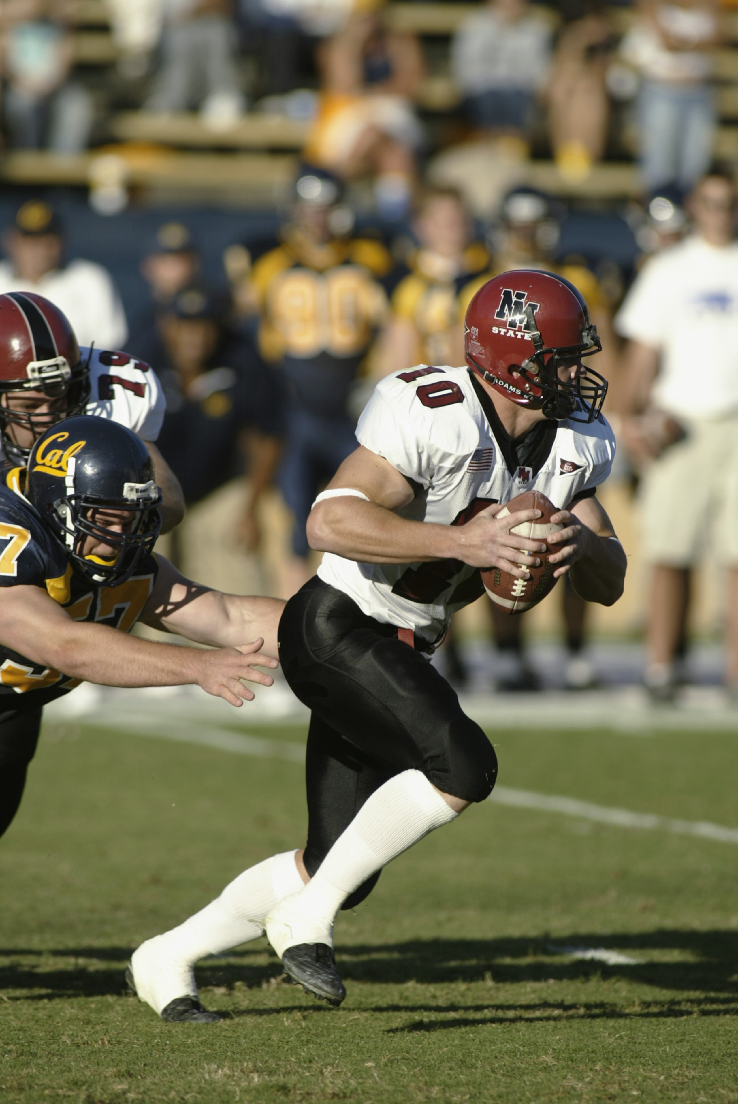 BERKELEY, CA - SEPTEMBER 7: Paul Dombrowski #10 quarterback of New Mexico State during the game against the California Golden Bears on September 7, 2002 at Memorial Stadium in Berkeley, California. (Photo By Scott Halleran/Getty Images) BERKELEY, CA - SEPTEMBER 7: Paul Dombrowski #10 quarterback of New Mexico State during the game against the California Golden Bears on September 7, 2002 at Memorial Stadium in Berkeley, California. (Photo By Scott Halleran/Getty Images)