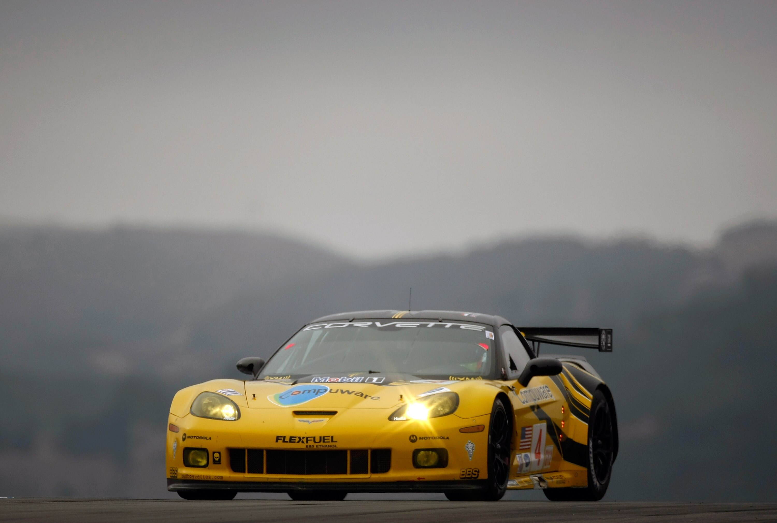 MONTEREY, CA - OCTOBER 09:  The #4 Corvette C6R driven by Olivier Berretta and Oliver Gavin during practice for the ALMS Monterey Sports Car Championships at Mazda Laguna Seca Raceway on October 9, 2009 in Monterey, California.  (Photo by Jonathan Ferrey/