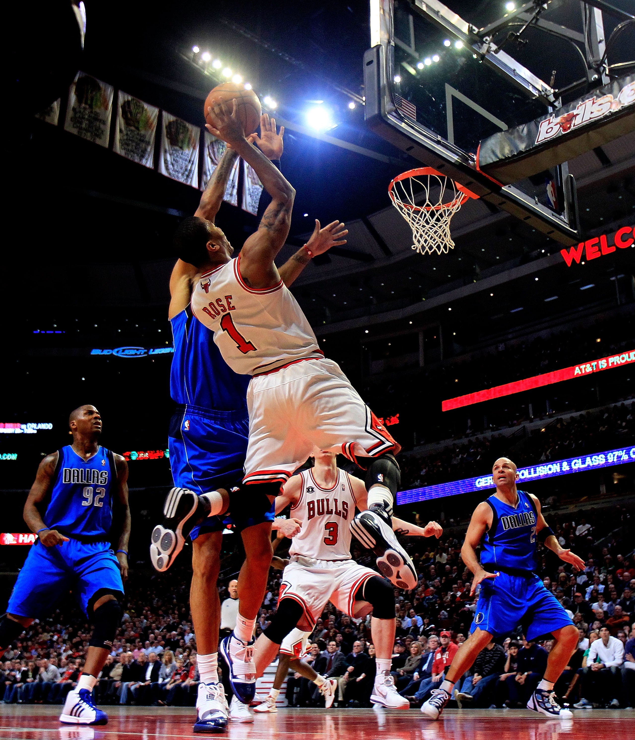 CHICAGO, IL - JANUARY 20: Derrick Rose #1 of the Chicago Bulls puts up a shot against Dirk Nowitzki #41 of the Dallas Mavericks at the United Center on January 20, 2011 in Chicago, Illinois. The Bulls defeated the Mavericks 82-77. NOTE TO USER: User expre