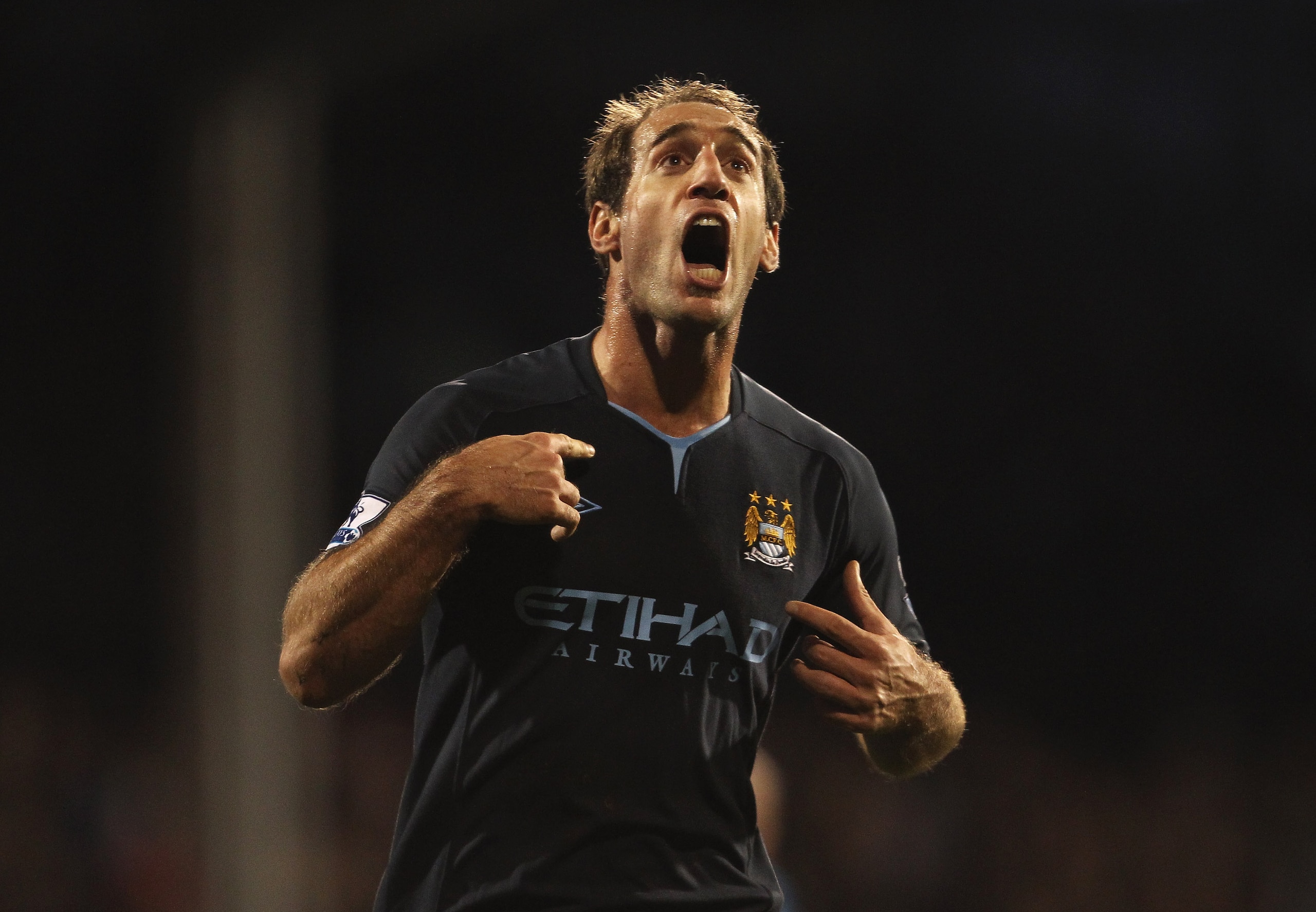 LONDON, ENGLAND - NOVEMBER 21:  Pablo Zabaleta of Manchester City celebrates scoring his teams second goal during the Barclays Premier League match between Fulham and Manchester City at Craven Cottage on November 21, 2010 in London, England.  (Photo by Sc