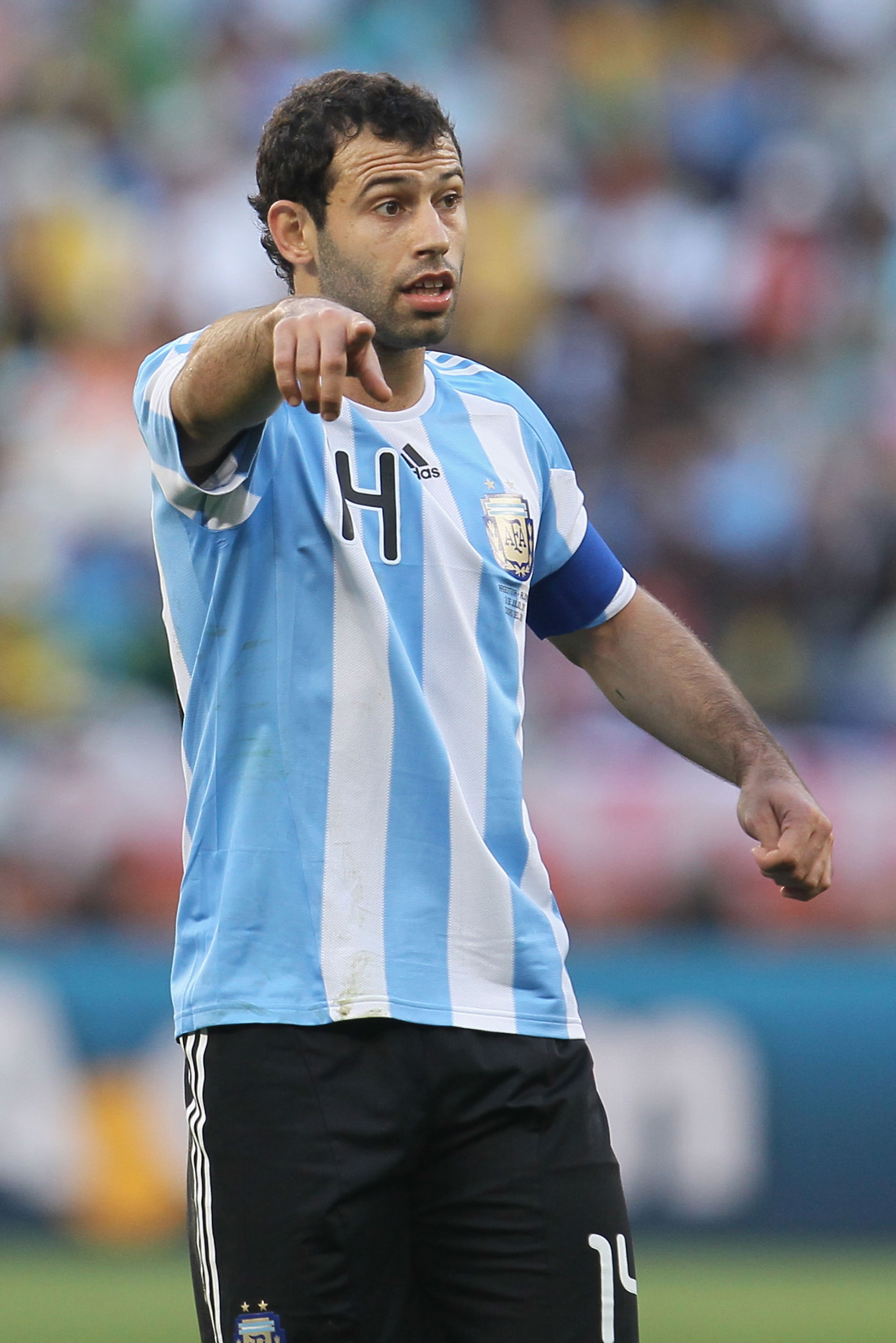CAPE TOWN, SOUTH AFRICA - JULY 03: Javier Mascherano captain of Argentina, directs his team mates during the 2010 FIFA World Cup South Africa Quarter Final match between Argentina and Germany at Green Point Stadium on July 3, 2010 in Cape Town, South Afri
