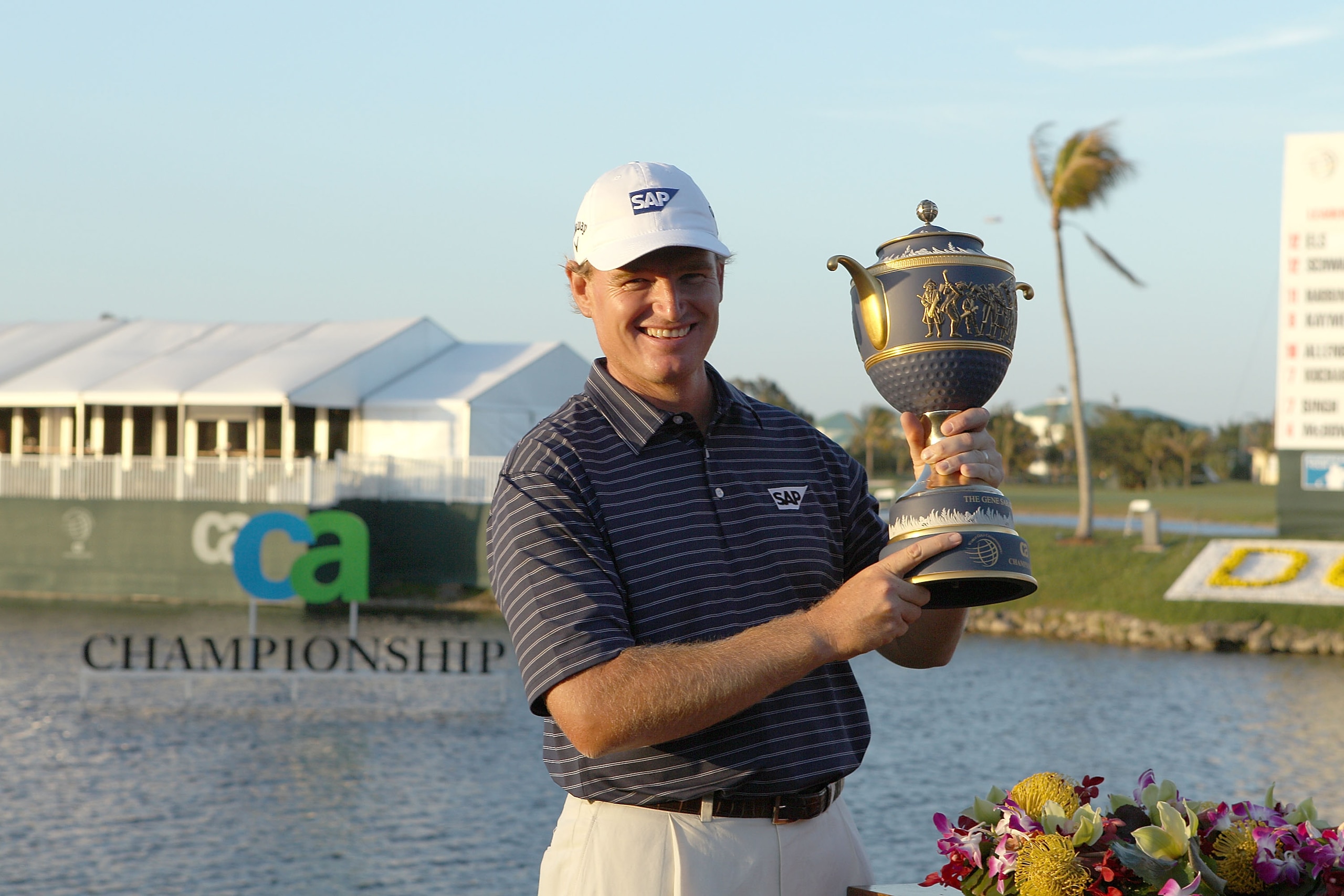 DORAL, FL - MARCH 14:  Ernie Els of South Africa lifts the Gene Sarazen Cup trophy on the 18th hole after winning the 2010 WGC-CA Championship at the TPC Blue Monster at Doral on March 14, 2010 in Doral, Florida.  (Photo by Scott Halleran/Getty Images)