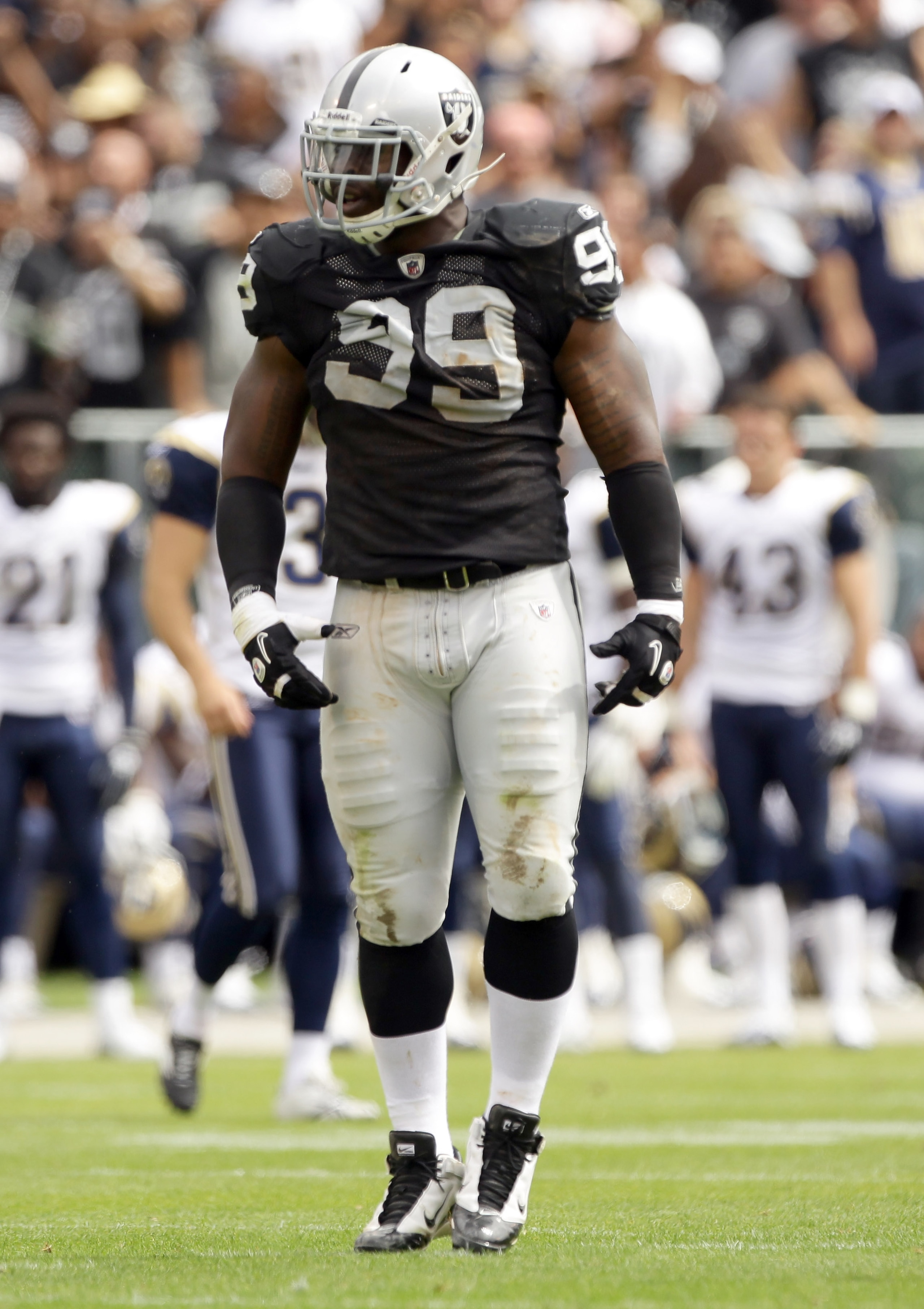 OAKLAND, CA - SEPTEMBER 19:  Lamarr Houston #99 of the Oakland Raiders in action during their game against the St. Louis Rams at the Oakland-Alameda County Coliseum on September 19, 2010 in Oakland, California.  (Photo by Ezra Shaw/Getty Images)