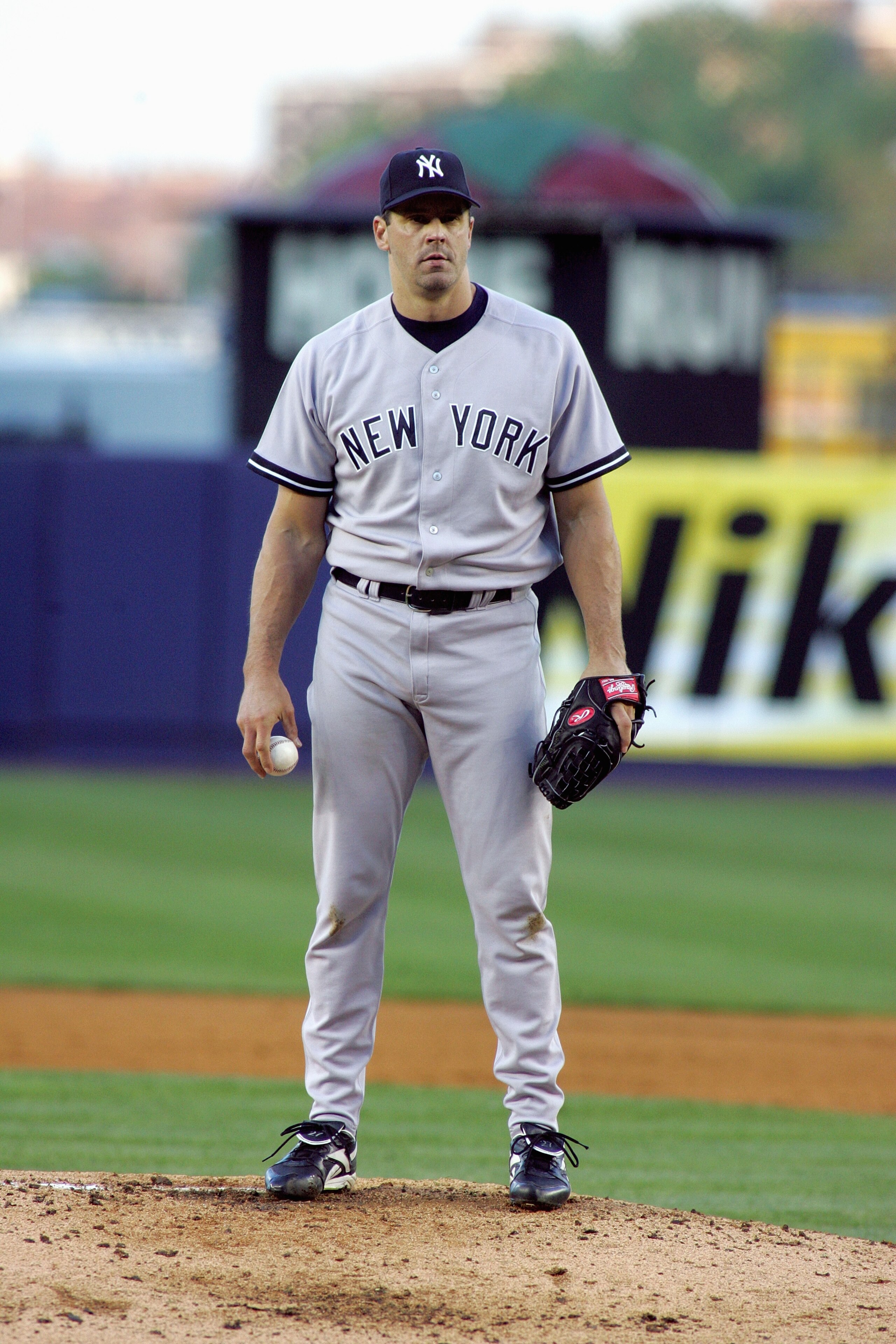 FLUSHING, NY - MAY 20:  Kevin Brown #27 of the New York Yankees pitches during the game with the New York Mets at Shea Stadium on May 20, 2005 in Flushing, New York.The Yankees defeated the Mets 5-2.(Photo by Jim McIsaac /Getty Images)