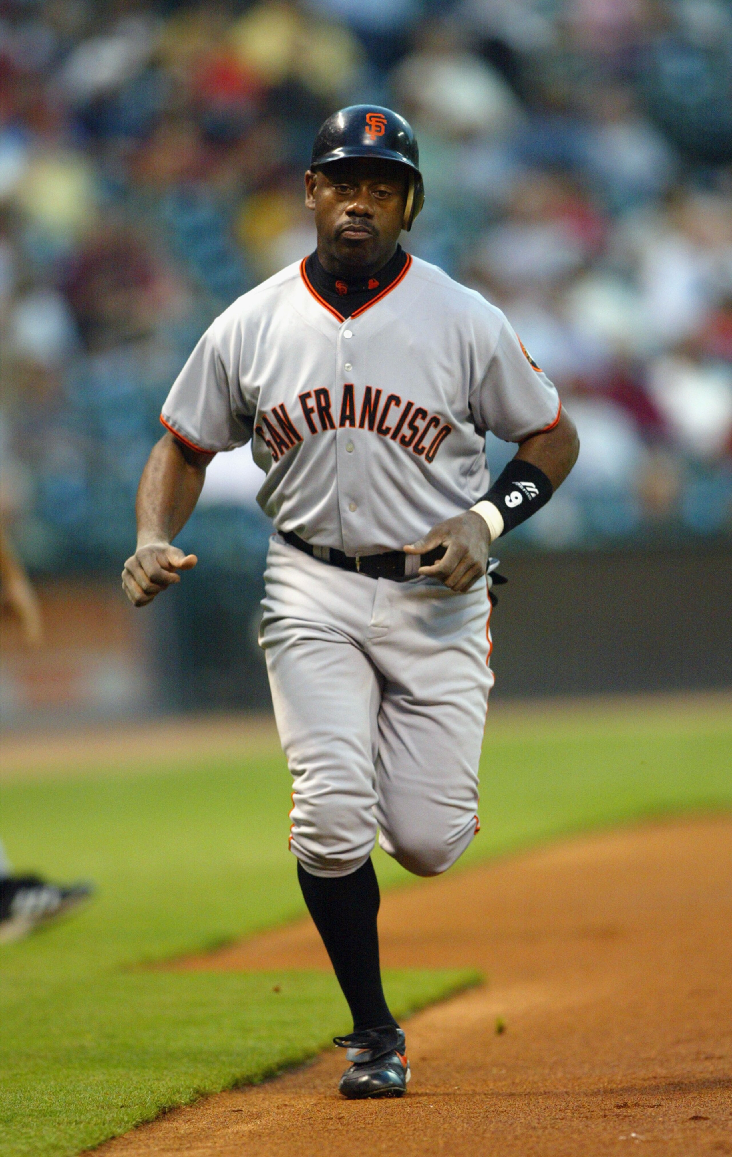 HOUSTON, TX - SEPTEMBER 22:  Marquis Grissom #9 of the San Francisco Giants circles the bases after hitting a home run in the first inning of the game against the Houston Astros on September 22, 2003  at Minute Maid Park in Houston, Texas.  The Giants won