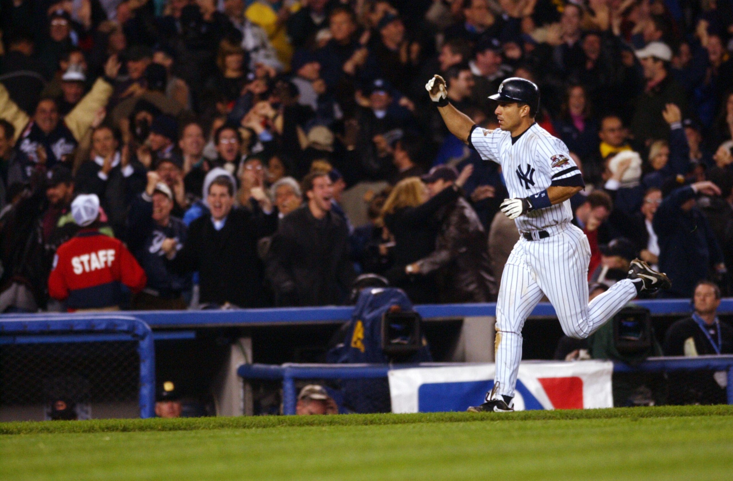 31 Oct 2001:  Tino Martinez #24 of the New York Yankees circles the bases after hitting a two run home run in the 9th inning to tie the Arizona Diamondbacks during game four of the Major League Baseball World Series at Yankee Stadium in New York, New York