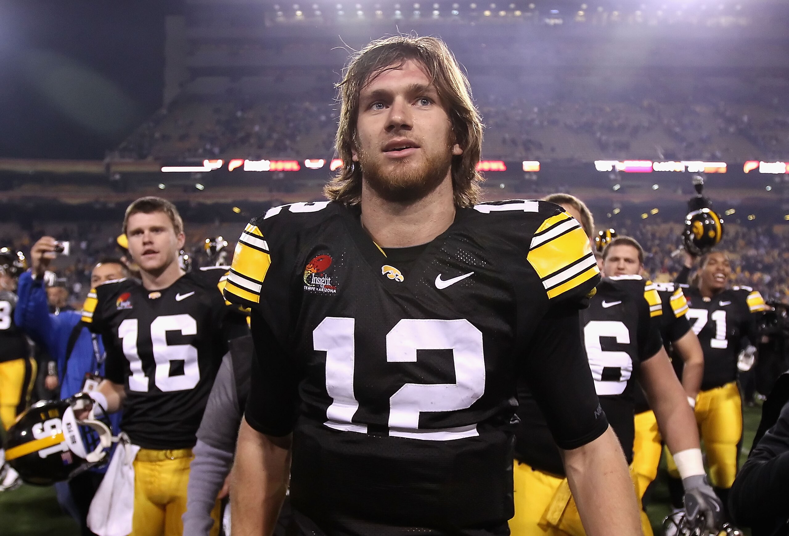 TEMPE, AZ - DECEMBER 28: Quarterback Ricky Stanzi #12 of the Iowa Hawkeyes walks off the field after defeating the Missouri Tigers in the Insight Bowl at Sun Devil Stadium on December 28, 2010 in Tempe, Arizona. The Hawkeyes defeated the Tigers 27-24. (P TEMPE, AZ - DECEMBER 28: Quarterback Ricky Stanzi #12 of the Iowa Hawkeyes walks off the field after defeating the Missouri Tigers in the Insight Bowl at Sun Devil Stadium on December 28, 2010 in Tempe, Arizona. The Hawkeyes defeated the Tigers 27-24. (P