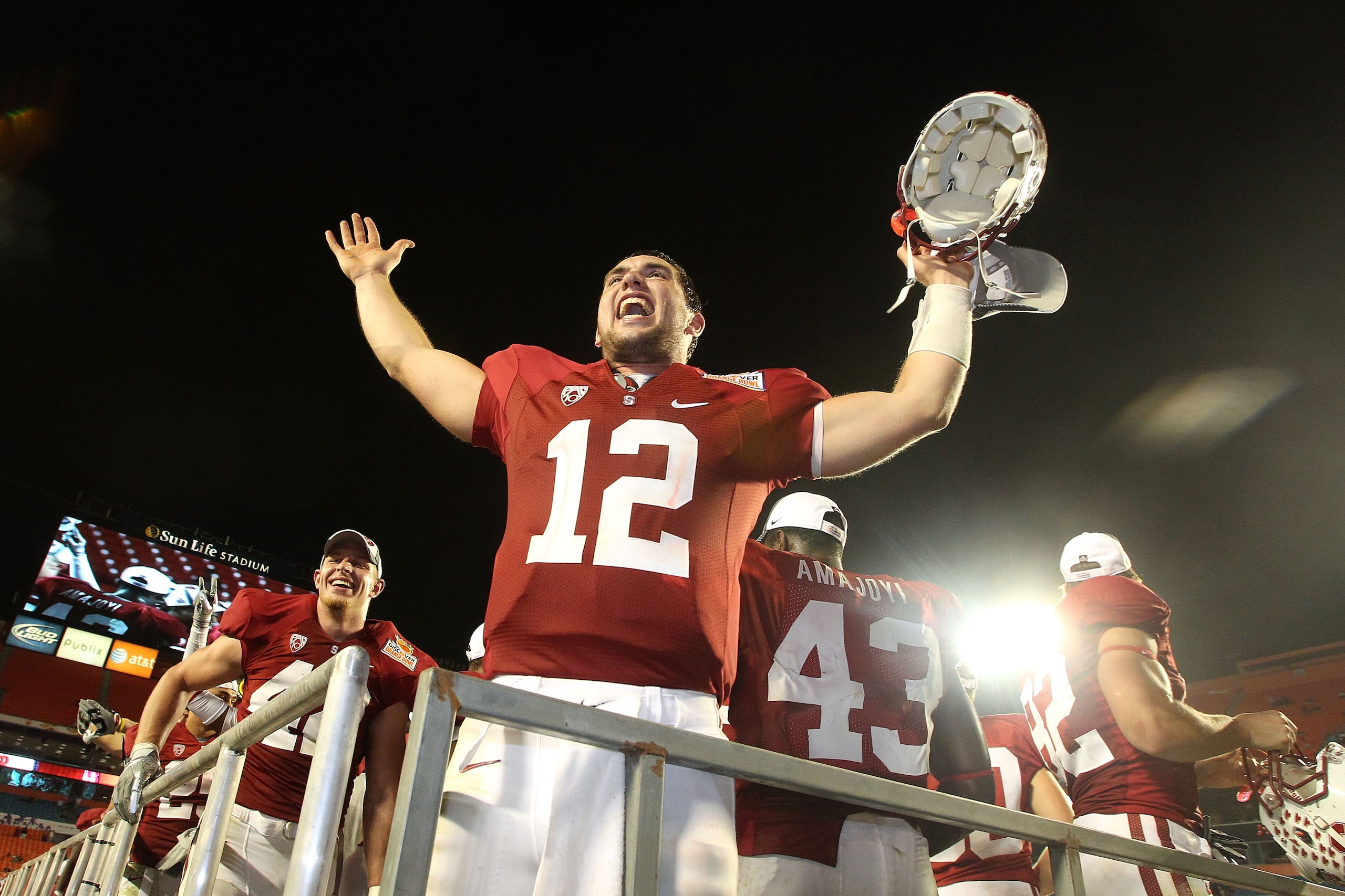 MIAMI, FL - JANUARY 03: Orange bowl MVP Andrew Luck of the Stanford Cardinal celebrates after Stanford won 40-12 against the Virginia Tech Hokies during the 2011 Discover Orange Bowl at Sun Life Stadium on January 3, 2011 in Miami, Florida. (Photo by Stre MIAMI, FL - JANUARY 03: Orange bowl MVP Andrew Luck of the Stanford Cardinal celebrates after Stanford won 40-12 against the Virginia Tech Hokies during the 2011 Discover Orange Bowl at Sun Life Stadium on January 3, 2011 in Miami, Florida. (Photo by Stre