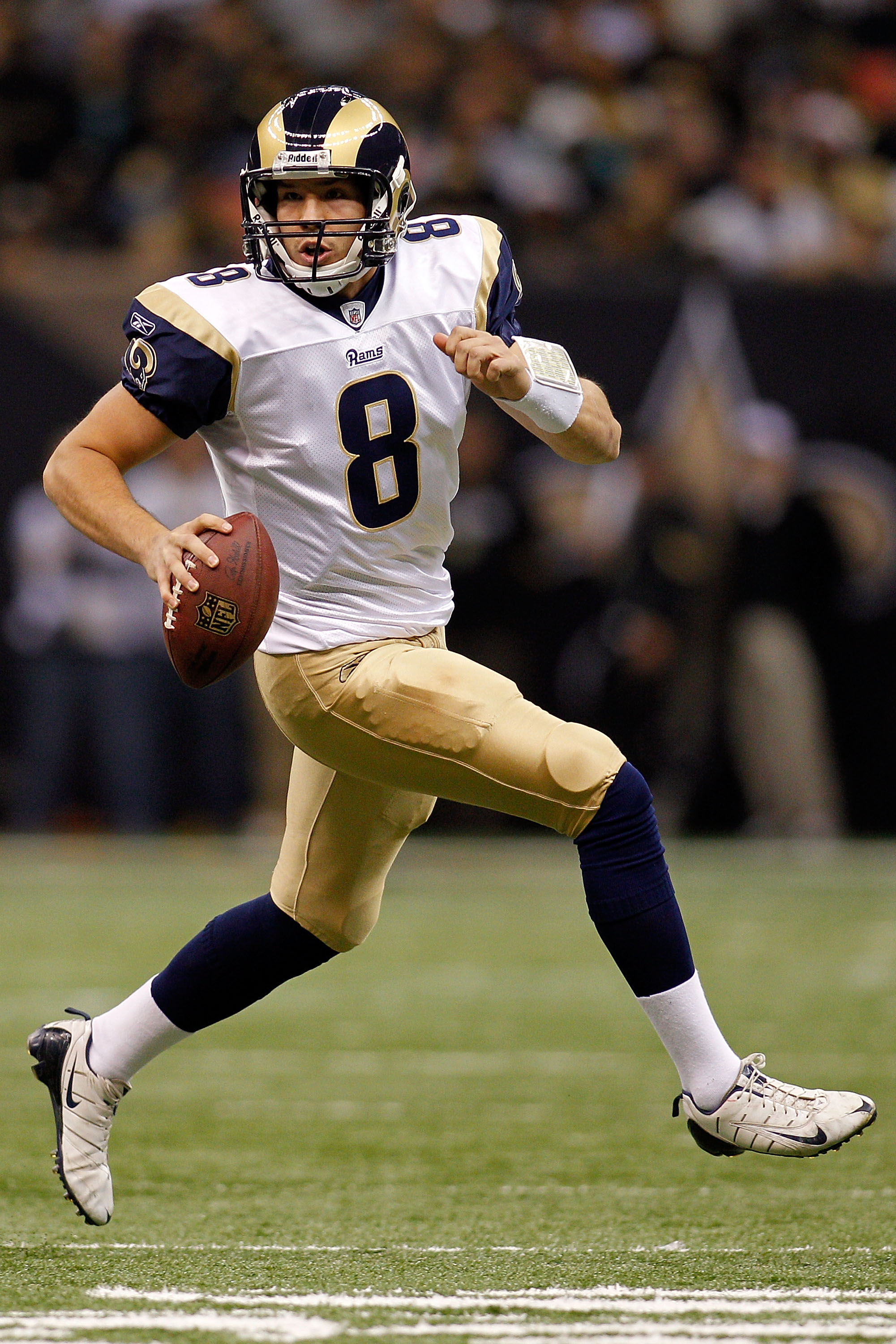 St. Louis Rams quarterback Sam Bradford (8) watches a replay after throwing  an interception for a touchdown against the Detroit Lions in the fourth  quarter of an NFL football game in Detroit