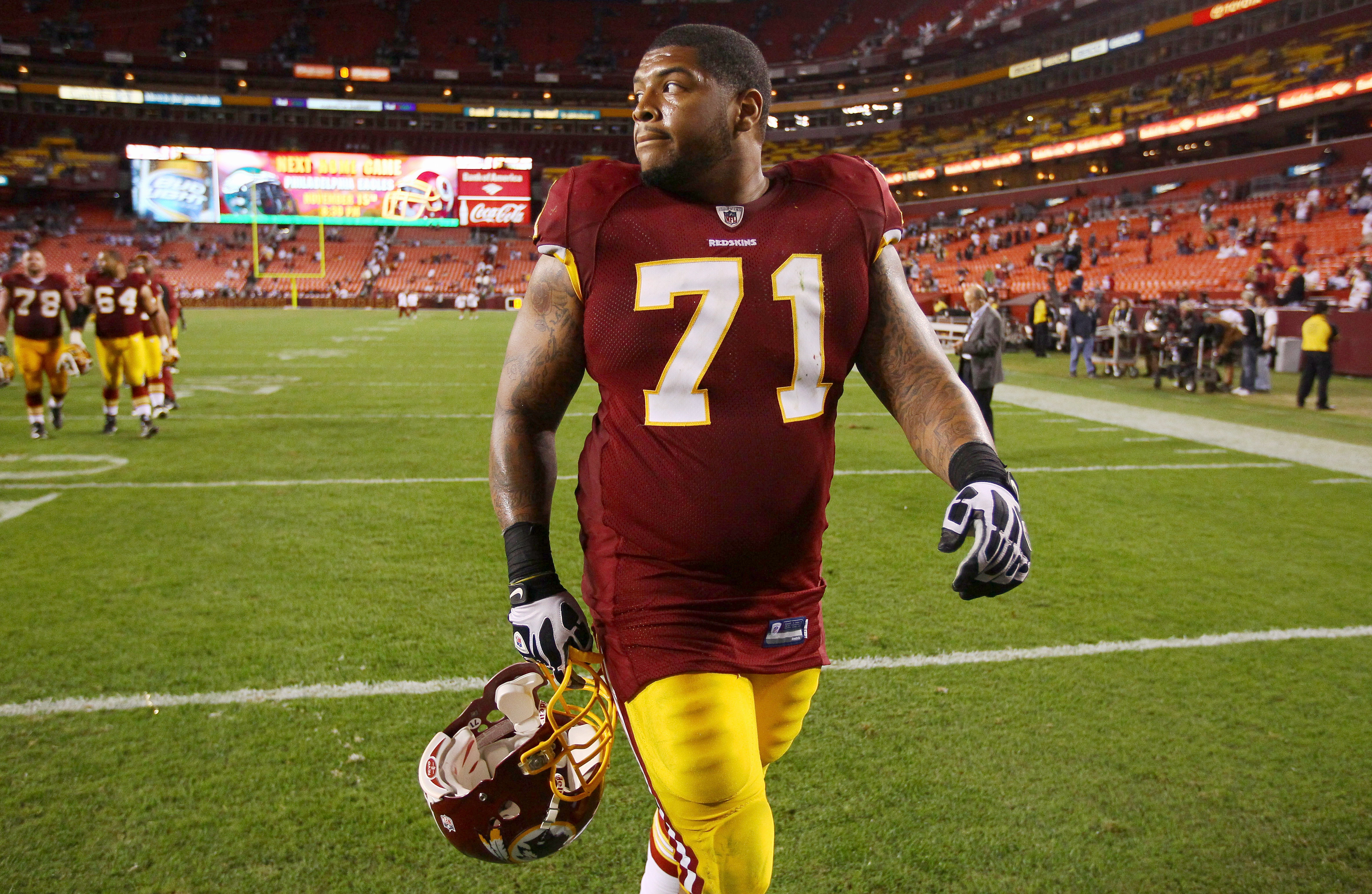 Washington Redskins running back Ladell Betts picks up a first down  reception for 25 yards against the St. Louis Rams in the fourth quarter at  FedEx Field in Landover, Maryland, on September