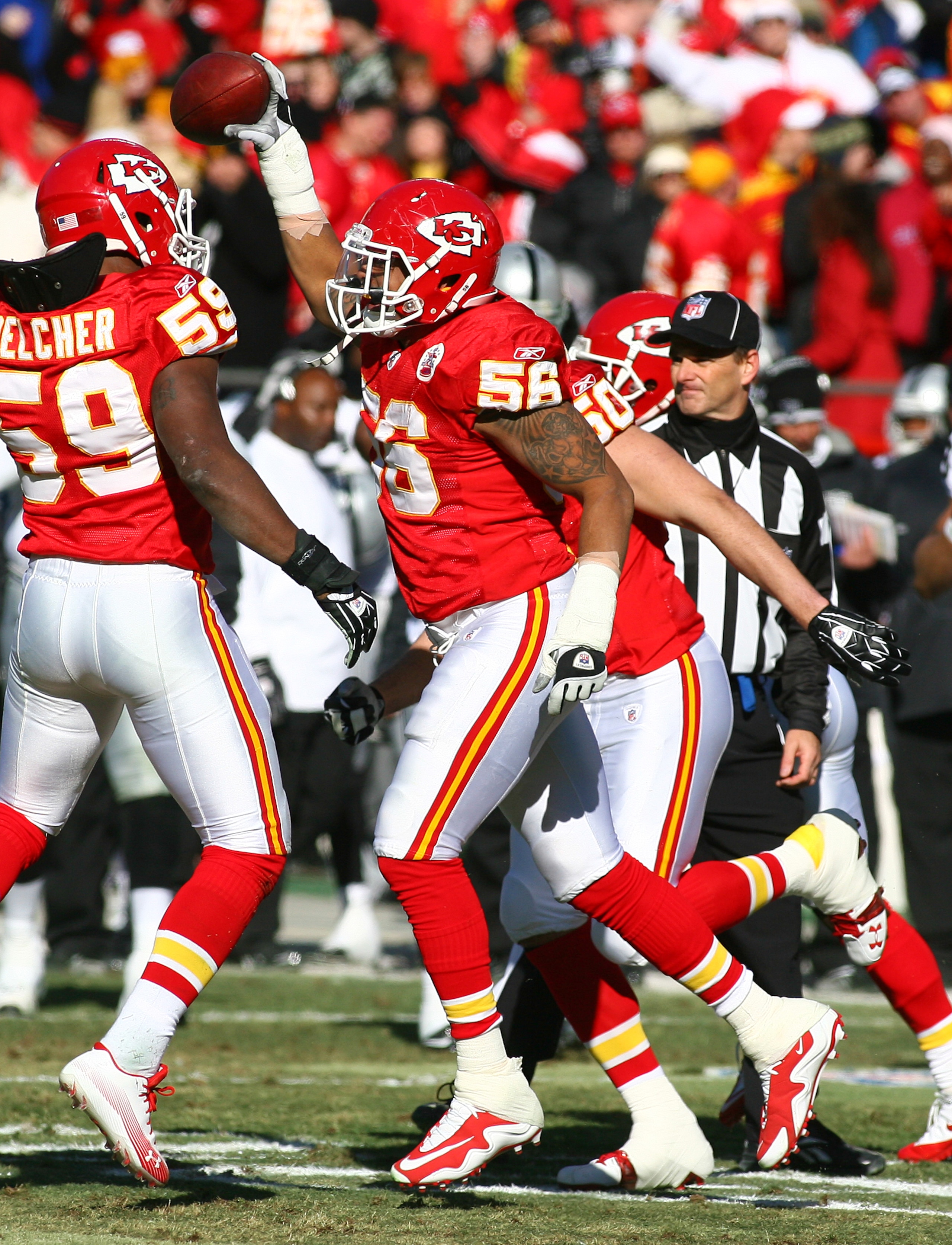 KANSAS CITY, MO - JANUARY 02:  Linebacker Derrick Johnson #56 of the Kansas City Chiefs celebrates after recovering a fumble in a game against the Oakland Raiders at Arrowhead Stadium on January 2, 2011 in Kansas City, Missouri.  (Photo by Tim Umphrey/Get
