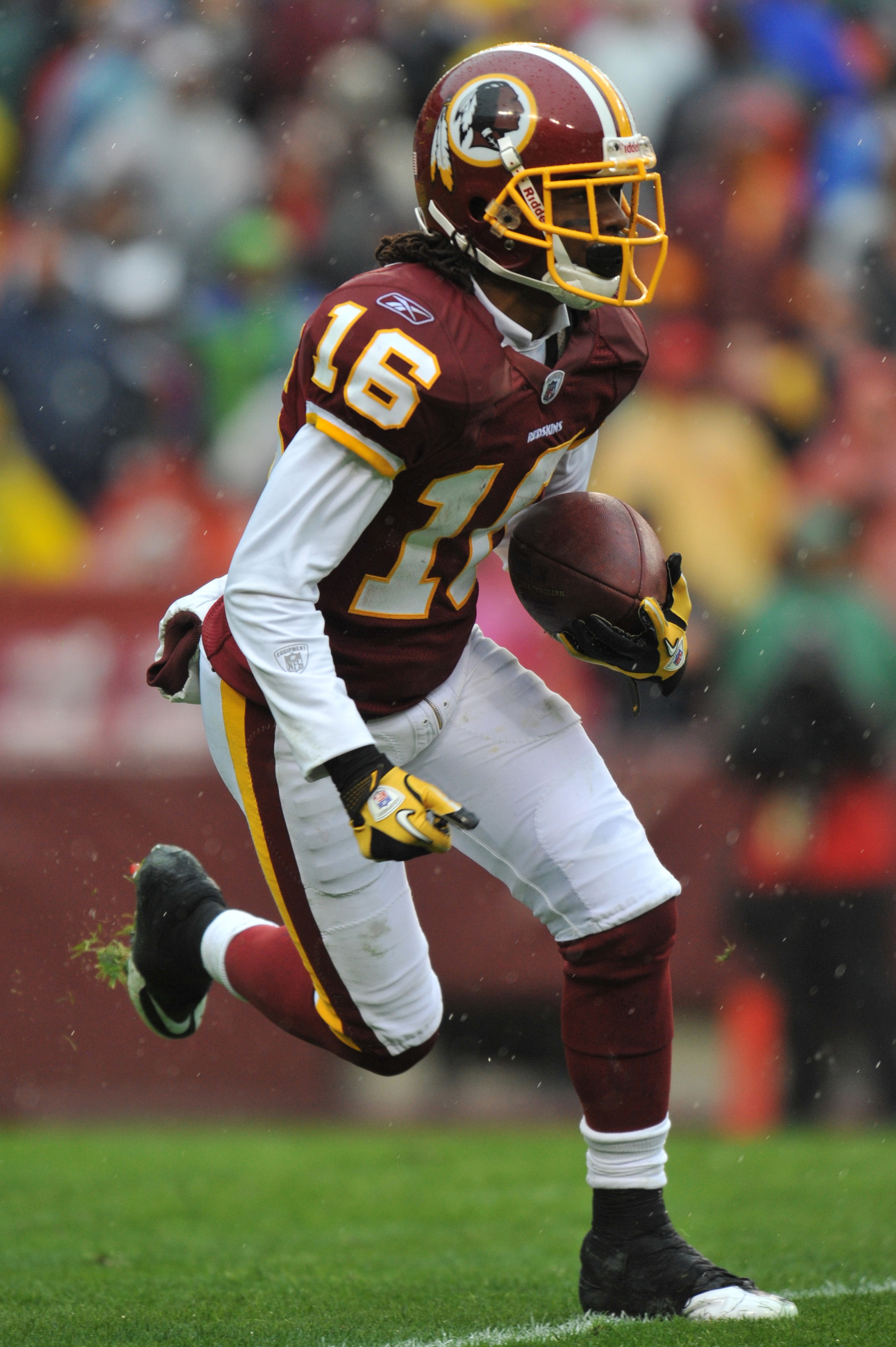 LANDOVER, MD - DECEMBER 12:  Brandon Banks #16 of the Washington Redskins runs the ball during the game against the Tampa Bay Buccaneers  at FedExField on December 12, 2010 in Landover, Maryland. The Buccaneers defeated the Redskins 17-16. (Photo by Larry