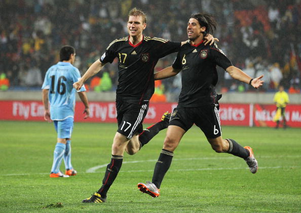 PORT ELIZABETH, SOUTH AFRICA - JULY 10:  Sami Khedira of Germany celebrates scoring his team's third goal with Per Mertesacker during the 2010 FIFA World Cup South Africa Third Place Play-off match between Uruguay and Germany at The Nelson Mandela Bay Sta