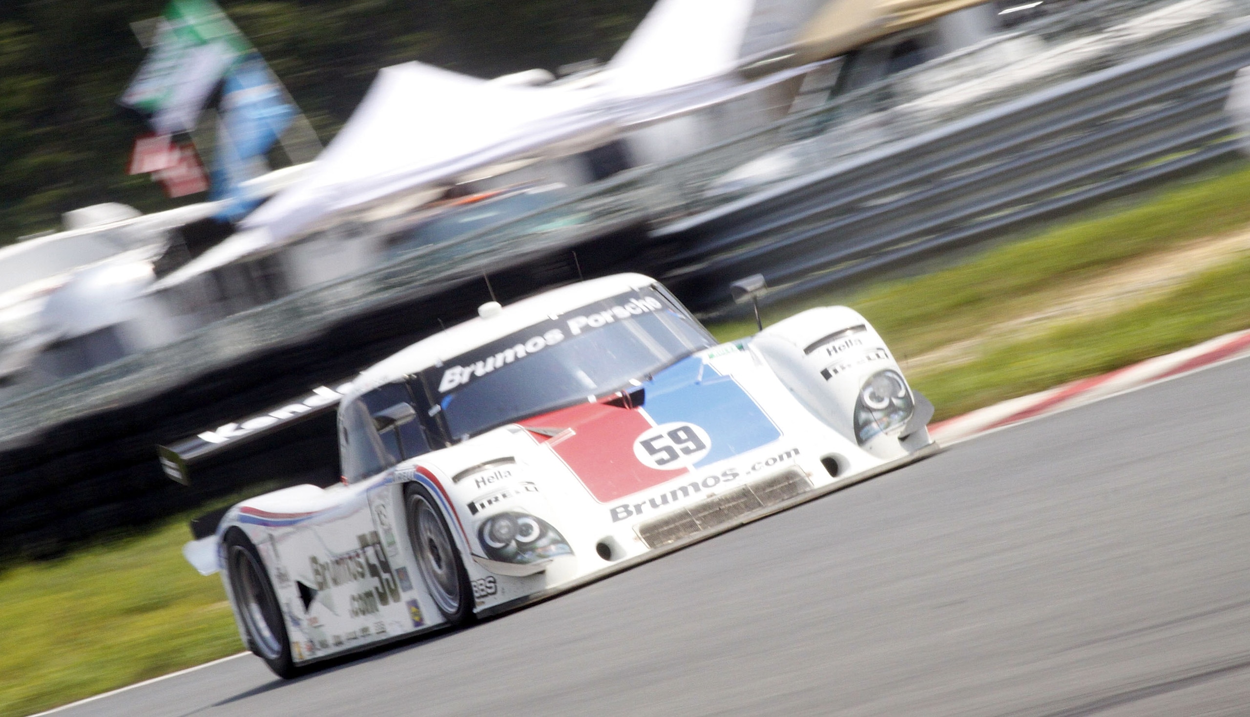 MILLVILLE, NJ - JULY 18:  The #59 Porsche Riley of David Donohue and Darren Law in action at the NJMP 250 on July 18, 2010 in Millville, New Jersey.  (Photo by Brian Cleary/Getty Images)