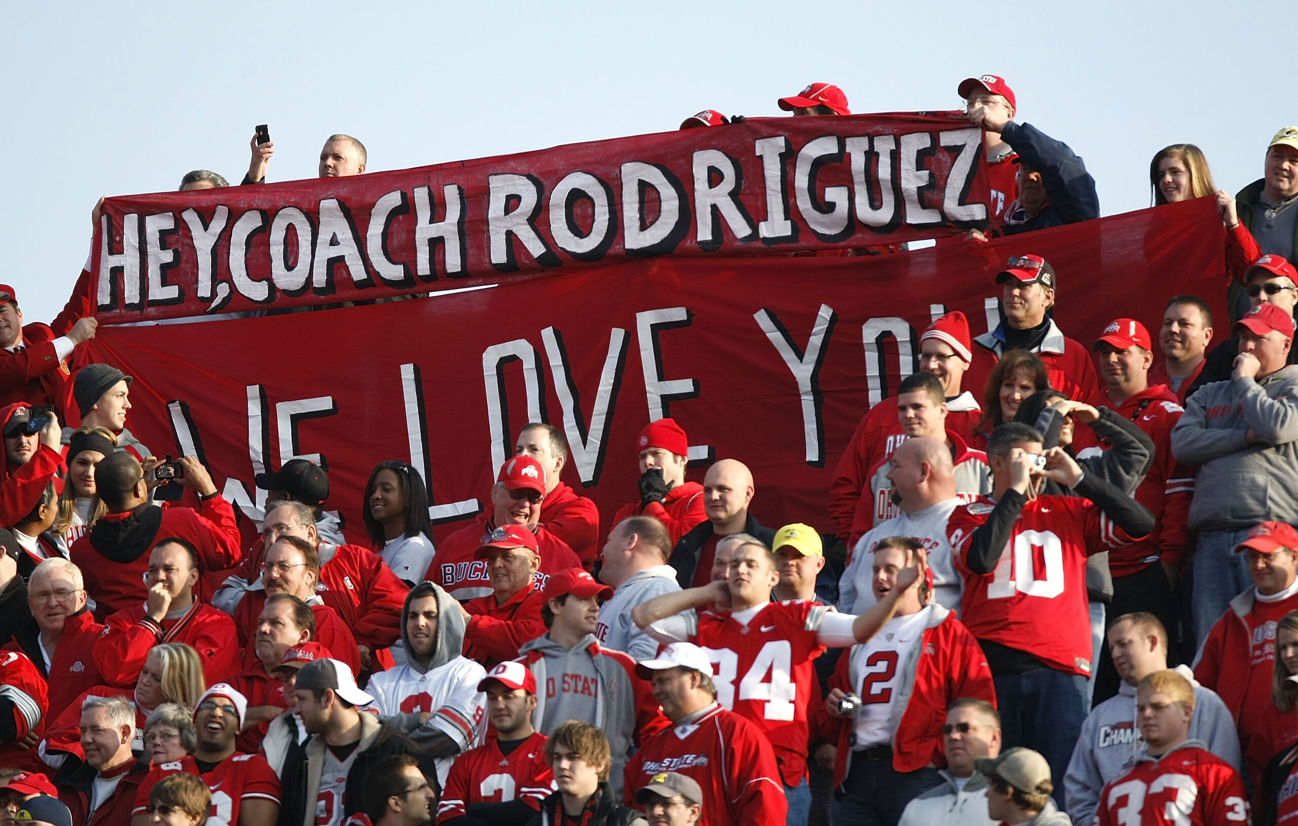 ANN ARBOR, MI - NOVEMBER 21: Fans of the Ohio State Buckeyes hold up a sign in support of head coach Rich Rodriguez of the Michigan Wolverines on November 21, 2009 at Michigan Stadium in Ann Arbor, Michigan. Ohio State won the game 21-10. (Photo by Gregor ANN ARBOR, MI - NOVEMBER 21: Fans of the Ohio State Buckeyes hold up a sign in support of head coach Rich Rodriguez of the Michigan Wolverines on November 21, 2009 at Michigan Stadium in Ann Arbor, Michigan. Ohio State won the game 21-10. (Photo by Gregor