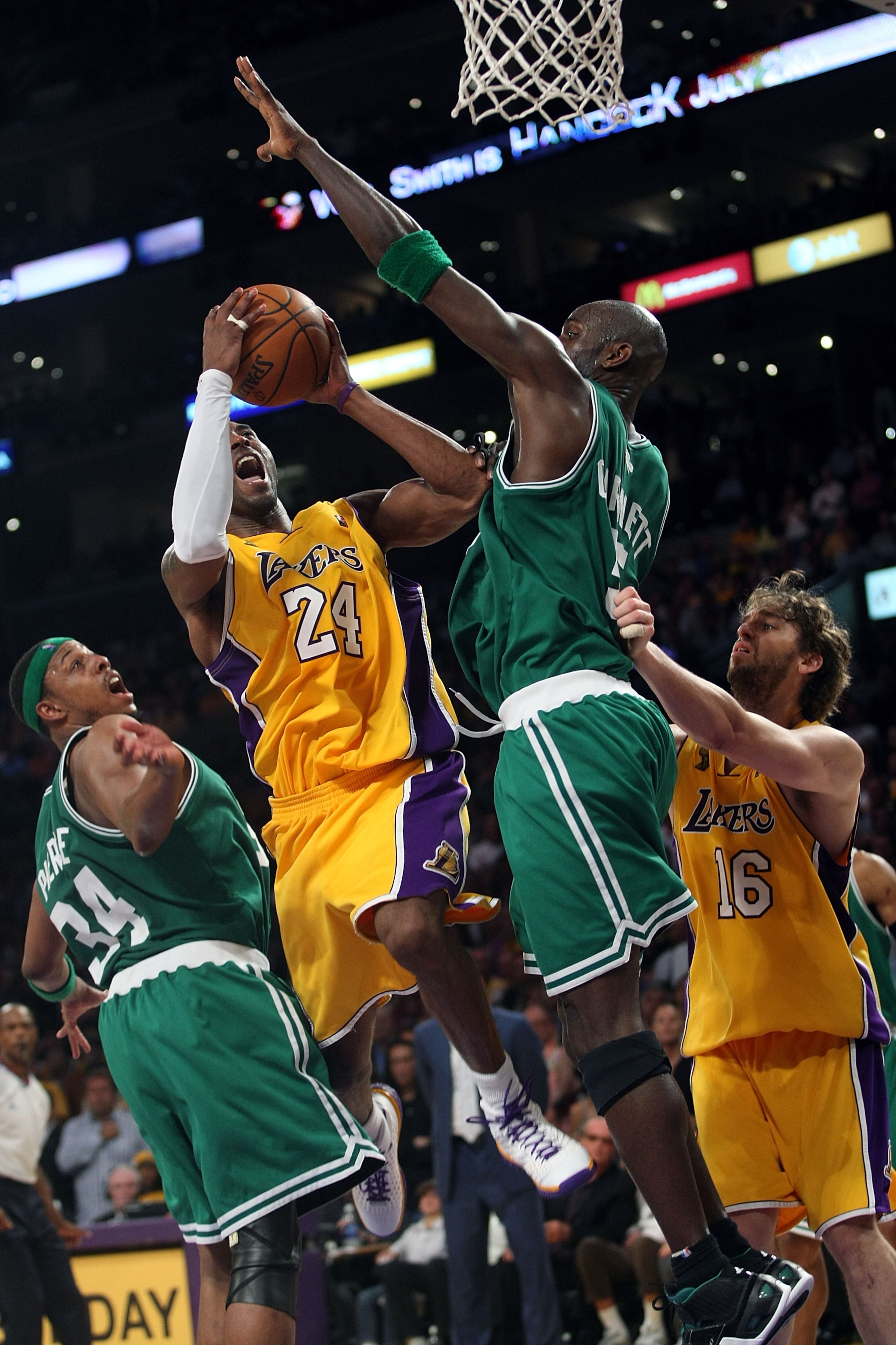 LOS ANGELES, CA - JUNE 12: Kobe Bryant #24 of the Los Angeles Lakers goes up for a shot against Kevin Garnett #5 and Paul Pierce #34 of the Boston Celtics in Game Four of the 2008 NBA Finals on June 12, 2008 at Staples Center in Los Angeles, California. LOS ANGELES, CA - JUNE 12: Kobe Bryant #24 of the Los Angeles Lakers goes up for a shot against Kevin Garnett #5 and Paul Pierce #34 of the Boston Celtics in Game Four of the 2008 NBA Finals on June 12, 2008 at Staples Center in Los Angeles, California.