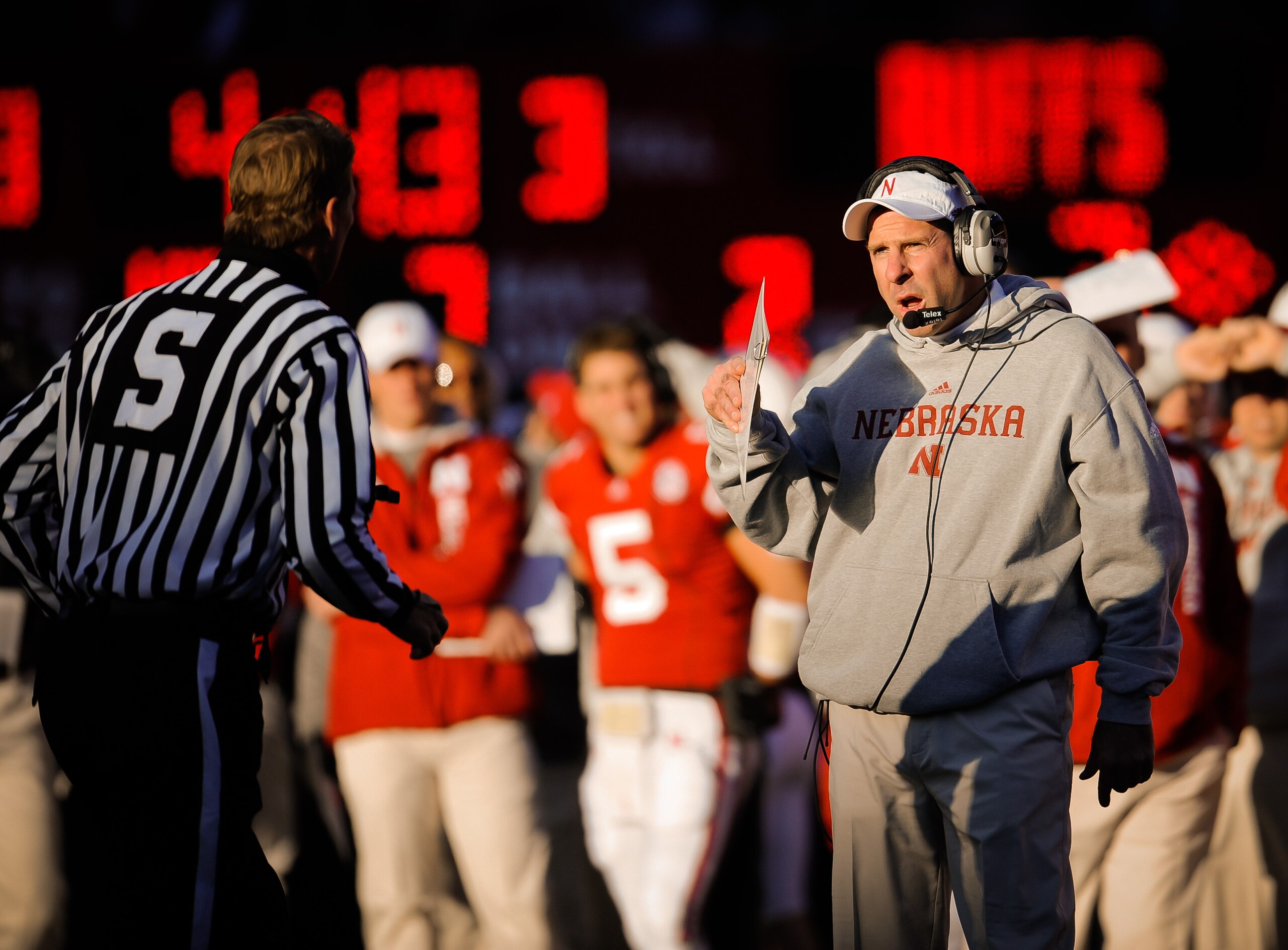 LINCOLN, NE - NOVEMBER 26: Coach Bo Pelini of the Nebraska Cornhuskers chats with a game official during their game against the Colorado Buffaloes at Memorial Stadium on November 26, 2010 in Lincoln, Nebraska. Nebraska defeated Colorado 45-17 (Photo by Er