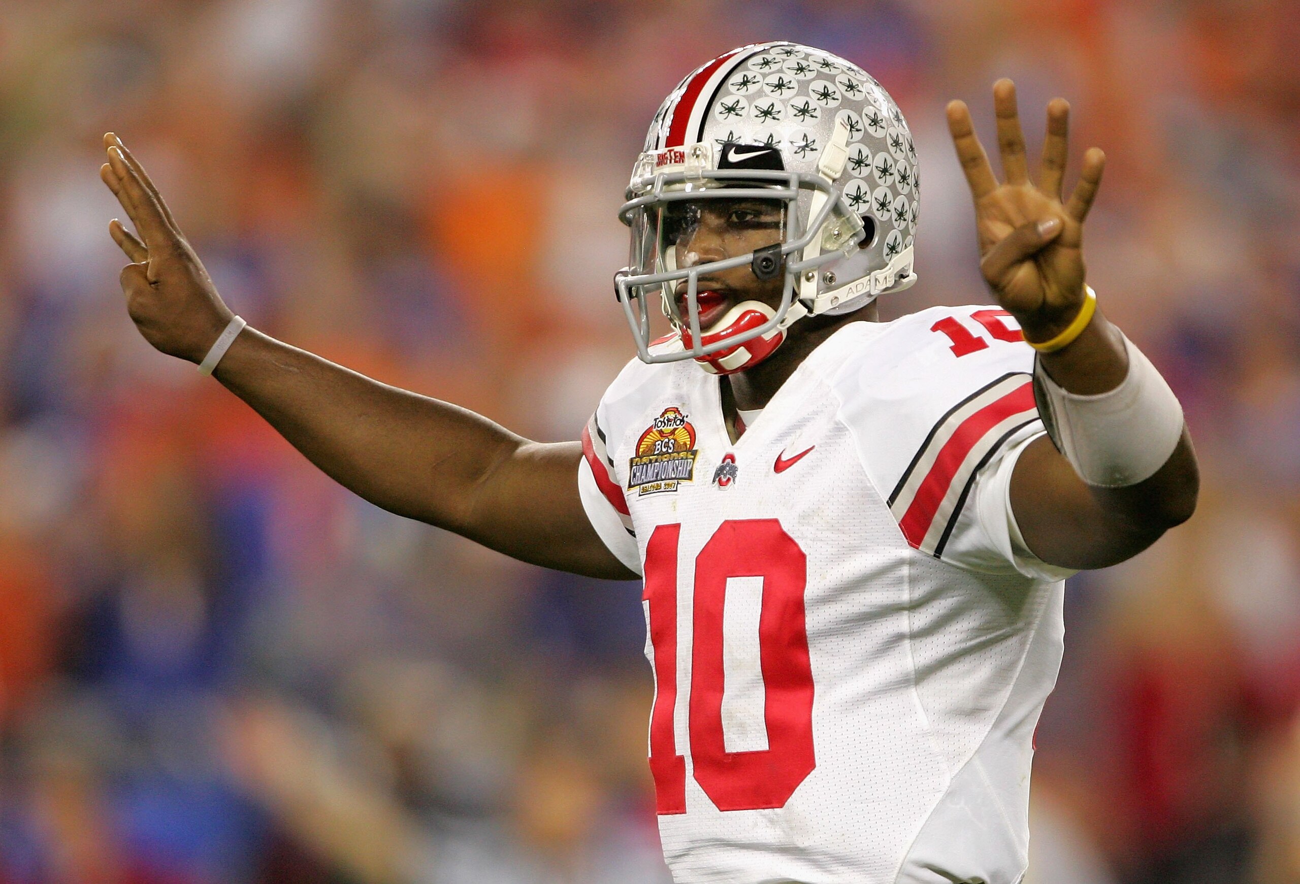 GLENDALE, AZ - JANUARY 08:  Quarterback Troy Smith #10 of the Ohio State Buckeyes calls a play against the Florida Gators during the 2007 Tostitos BCS National Championship Game at the University of Phoenix Stadium on January 8, 2007 in Glendale, Arizona.