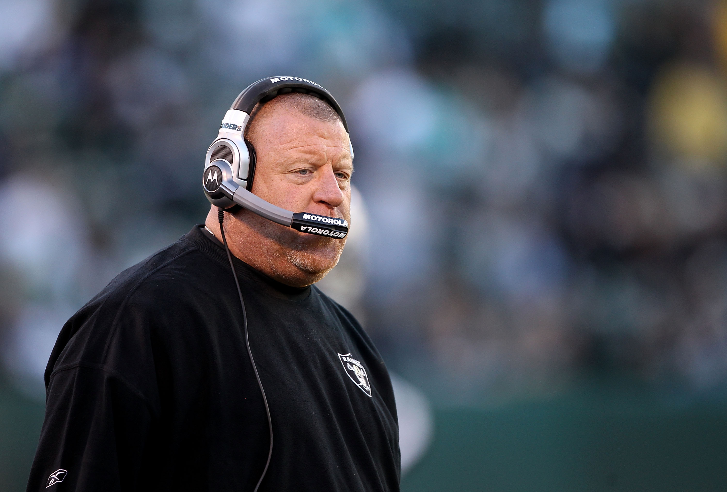 OAKLAND, CA - NOVEMBER 28:  Head coach Tom Cable of the Oakland Raiders walks the sidelines during the closing minutes of their loss to the Miami Dolphins at Oakland-Alameda County Coliseum on November 28, 2010 in Oakland, California.  (Photo by Ezra Shaw