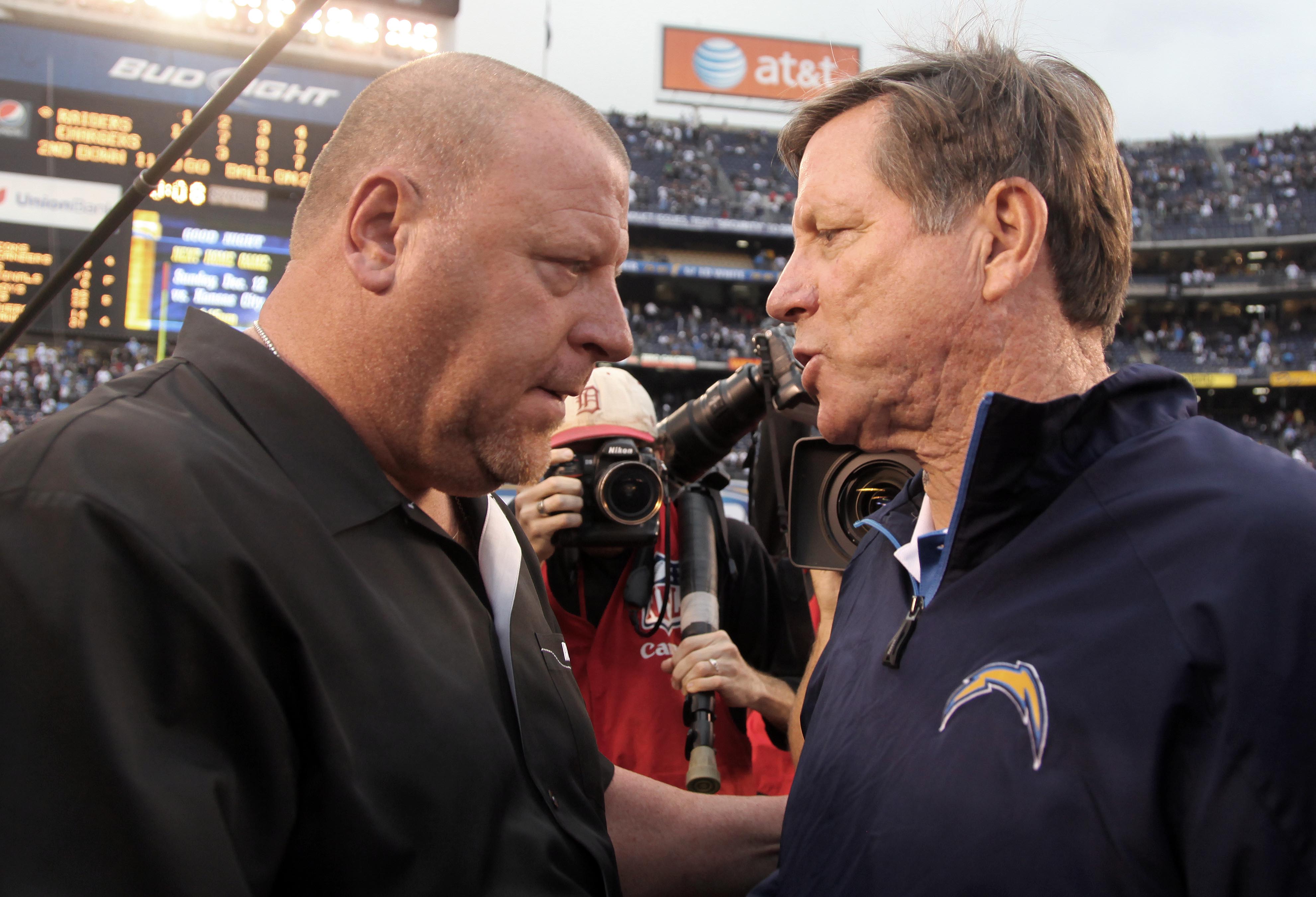 SAN DIEGO, CA - DECEMBER 5: Head Coach Tom Cable of the Oakland Raiders shakes the hand of Head Coach Norv Turner of the San Diego Chargers after the Raiders 24-13 victory during their NFL game at Qualcomm Stadium on December 5, 2010 in San Diego, Califor