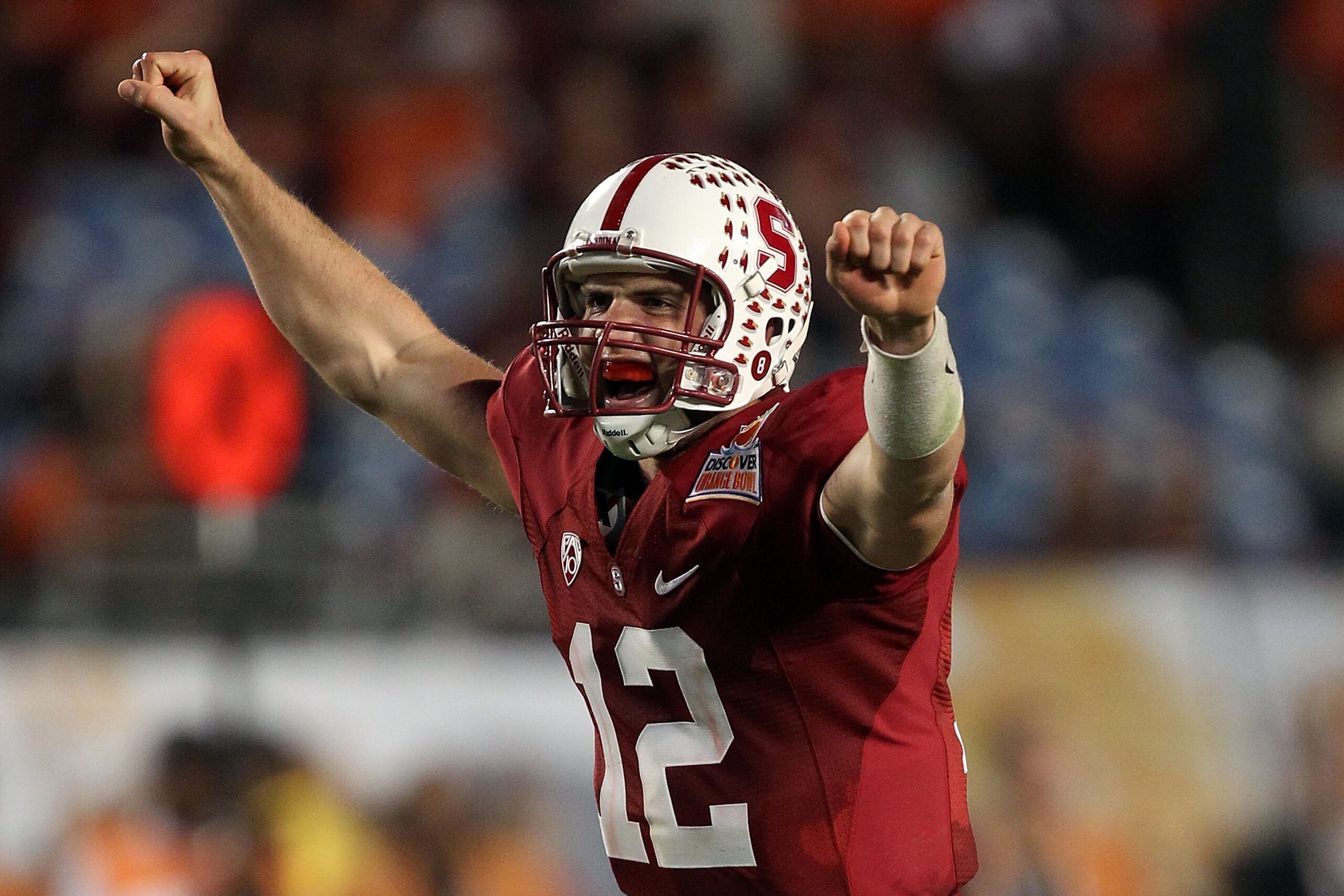 MIAMI, FL - JANUARY 03: Andrew Luck #12 of the Stanford Cardinal celebrates after he threw a 38-yard touchdown pass in the fourth quarter against the Virginia Tech Hokies during the 2011 Discover Orange Bowl at Sun Life Stadium on January 3, 2011 in Miami MIAMI, FL - JANUARY 03: Andrew Luck #12 of the Stanford Cardinal celebrates after he threw a 38-yard touchdown pass in the fourth quarter against the Virginia Tech Hokies during the 2011 Discover Orange Bowl at Sun Life Stadium on January 3, 2011 in Miami