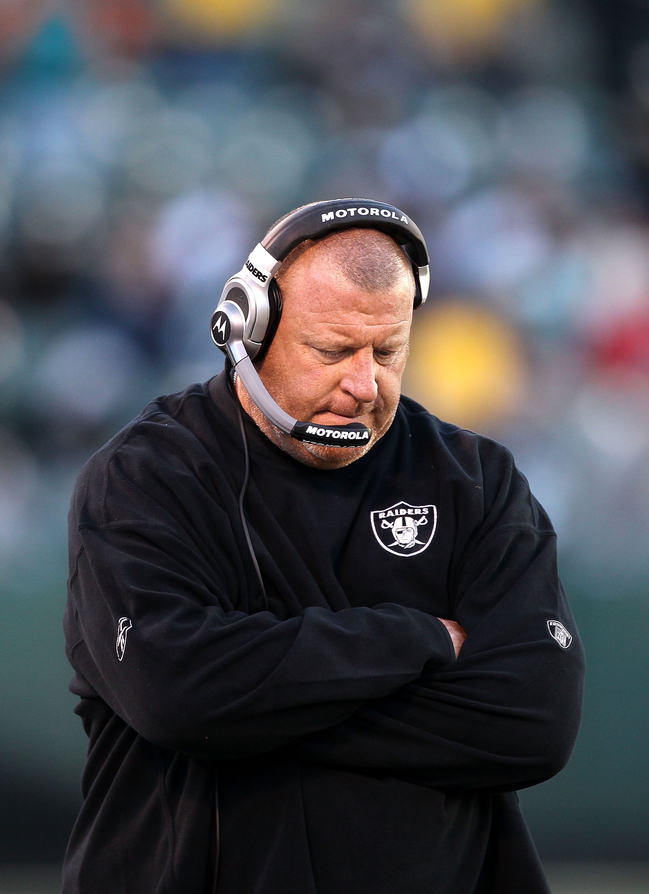 OAKLAND, CA - NOVEMBER 28:  Head coach Tom Cable of the Oakland Raiders walks the sidelines during the closing minutes of their loss to the Miami Dolphins at Oakland-Alameda County Coliseum on November 28, 2010 in Oakland, California.  (Photo by Ezra Shaw