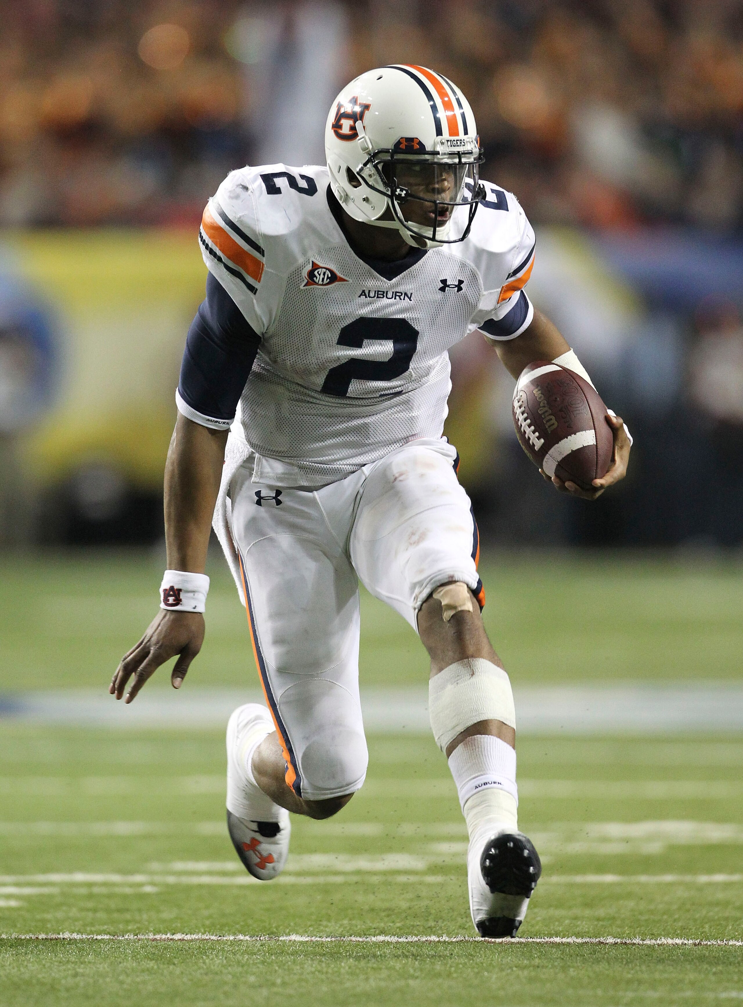 ATLANTA - DECEMBER 04: Quarterback Cam Newton #2 of the Auburn Tigers runs with the ball during the 2010 SEC Championship against the South Carolina Gamecocks at Georgia Dome on December 4, 2010 in Atlanta, Georgia. (Photo by Mike Zarrilli/Getty Images) ATLANTA - DECEMBER 04: Quarterback Cam Newton #2 of the Auburn Tigers runs with the ball during the 2010 SEC Championship against the South Carolina Gamecocks at Georgia Dome on December 4, 2010 in Atlanta, Georgia. (Photo by Mike Zarrilli/Getty Images)