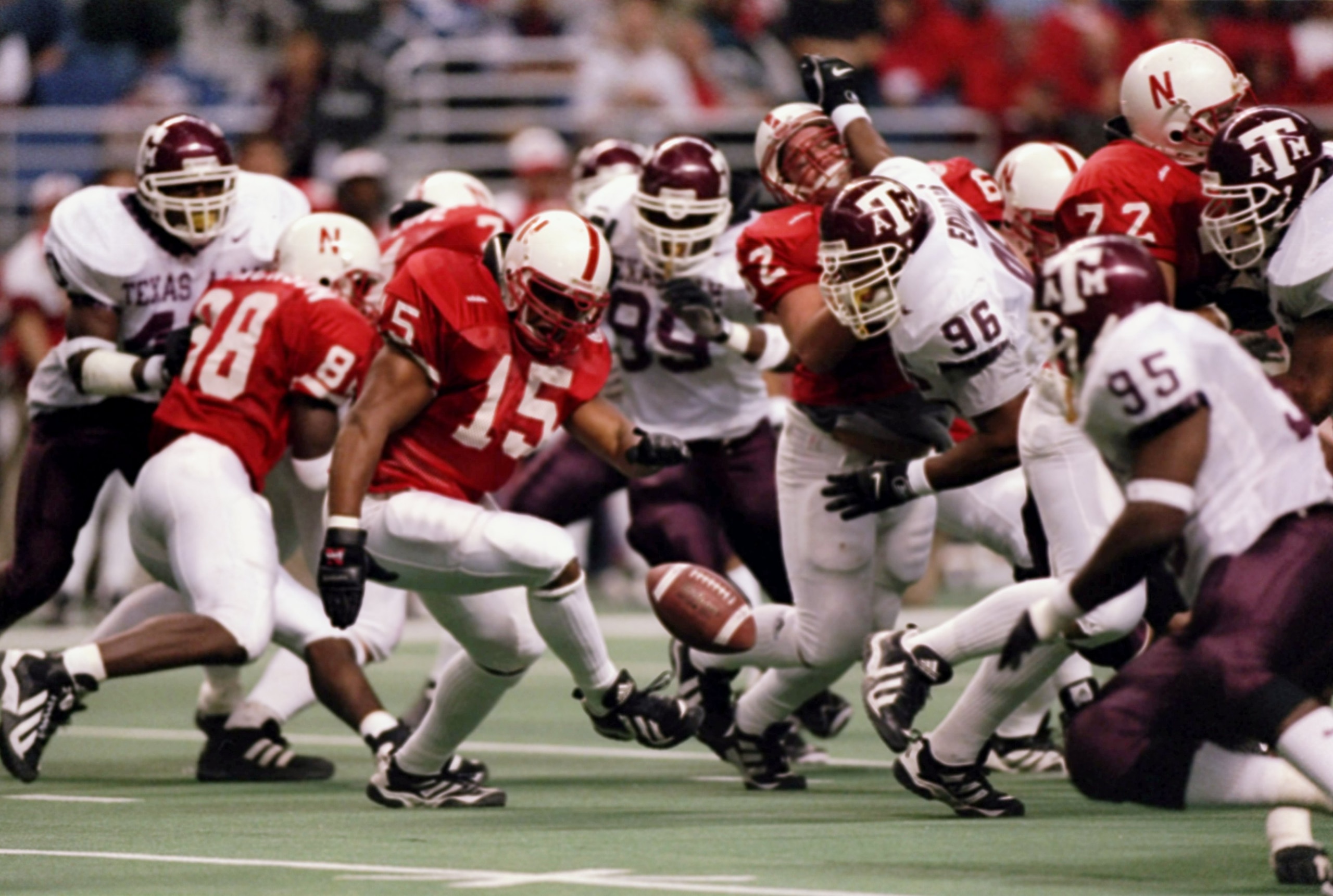 6 Dec 1997: Willie Miller of the Nebraska Cornhuskers looks at the ball during a game against the Texas A&M Aggies at the Alamodome in San Antonio, Texas. Nebraska won the game 54-15. Mandatory Credit: Stephen Dunn /Allsport 6 Dec 1997: Willie Miller of the Nebraska Cornhuskers looks at the ball during a game against the Texas A&M Aggies at the Alamodome in San Antonio, Texas. Nebraska won the game 54-15. Mandatory Credit: Stephen Dunn /Allsport