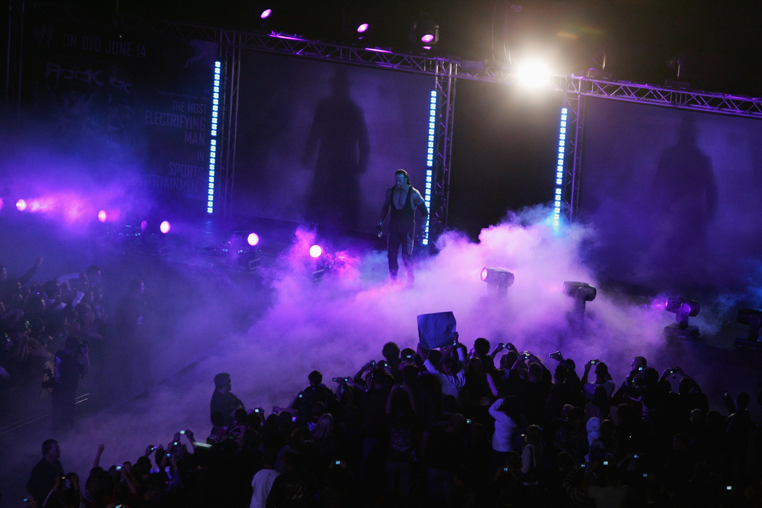 SYDNEY, AUSTRALIA - JUNE 15. The Undertaker enters the arena during WWE Smackdown at Acer Arena on June 15, 2008 in Sydney, Australia. (Photo by Gaye Gerard/Getty Images) SYDNEY, AUSTRALIA - JUNE 15. The Undertaker enters the arena during WWE Smackdown at Acer Arena on June 15, 2008 in Sydney, Australia. (Photo by Gaye Gerard/Getty Images)