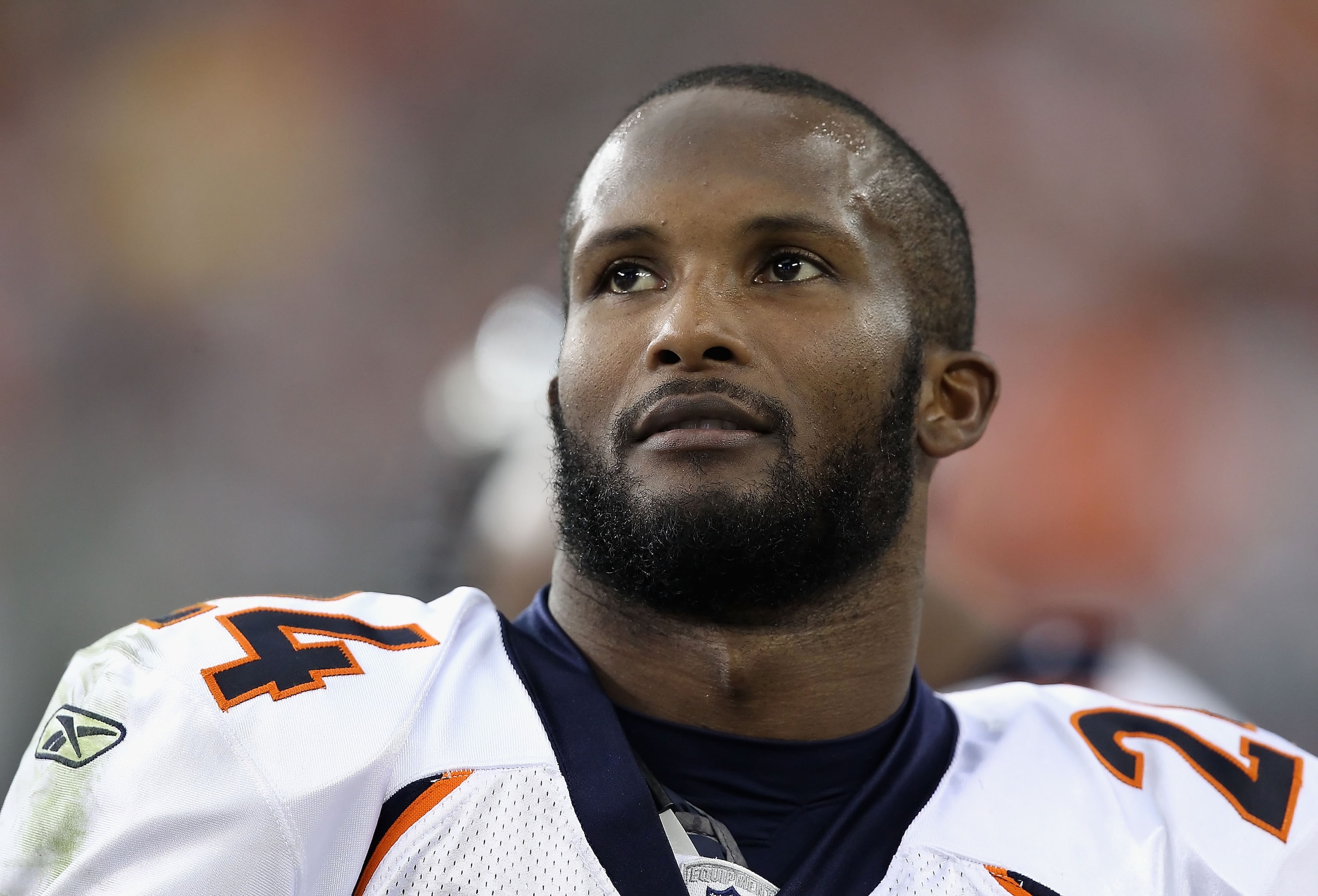 GLENDALE, AZ - DECEMBER 12: Cornerback Champ Bailey #24 of the Denver Broncos stands on the sidelines during the NFL game against the Arizona Cardinals at the University of Phoenix Stadium on December 12, 2010 in Glendale, Arizona. The Cardinals defeate GLENDALE, AZ - DECEMBER 12: Cornerback Champ Bailey #24 of the Denver Broncos stands on the sidelines during the NFL game against the Arizona Cardinals at the University of Phoenix Stadium on December 12, 2010 in Glendale, Arizona. The Cardinals defeate