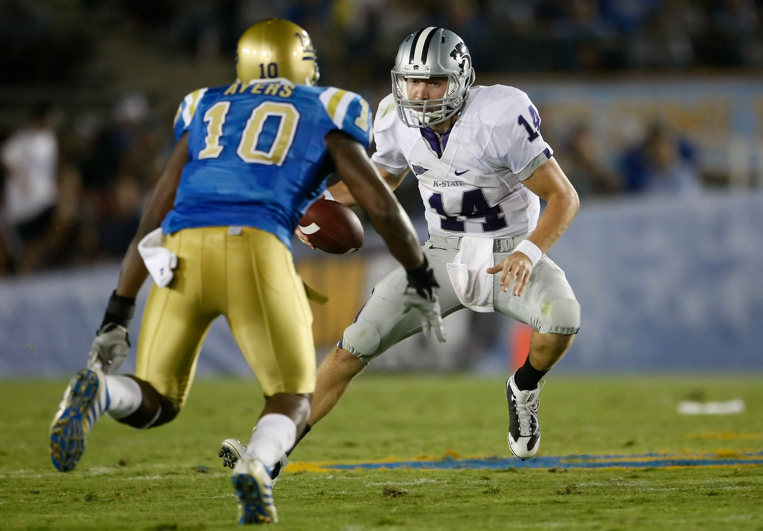 PASADENA, CA - SEPTEMBER 19: Quarterback Carson Coffman #14 of the Kansas State Wildcats is met by Akeem Ayers #10 of the UCLA Bruins in the first half at the Rose Bowl on September 19, 2009 in Pasadena, California. (Photo by Jeff Gross/Getty Images) PASADENA, CA - SEPTEMBER 19: Quarterback Carson Coffman #14 of the Kansas State Wildcats is met by Akeem Ayers #10 of the UCLA Bruins in the first half at the Rose Bowl on September 19, 2009 in Pasadena, California. (Photo by Jeff Gross/Getty Images)