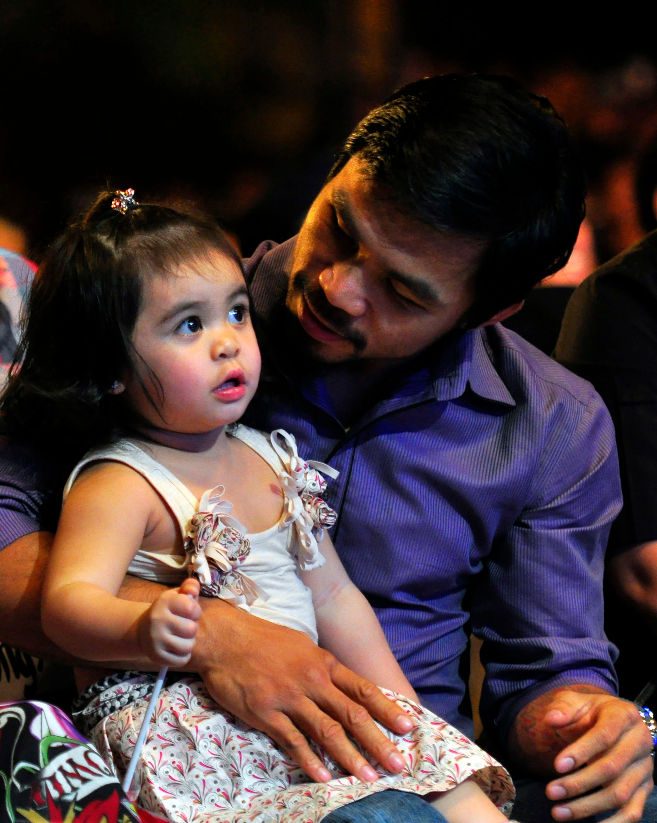 MANILA, PHILIPPINES - NOVEMBER 20:  Boxer and congressman, Manny Pacquiao attends his concert in Manila with wife Jinky and youngest daughter Qeen Elizabeth following his win of the WBC super welterweight crown against Mexican Antonio Margarito on Novembe