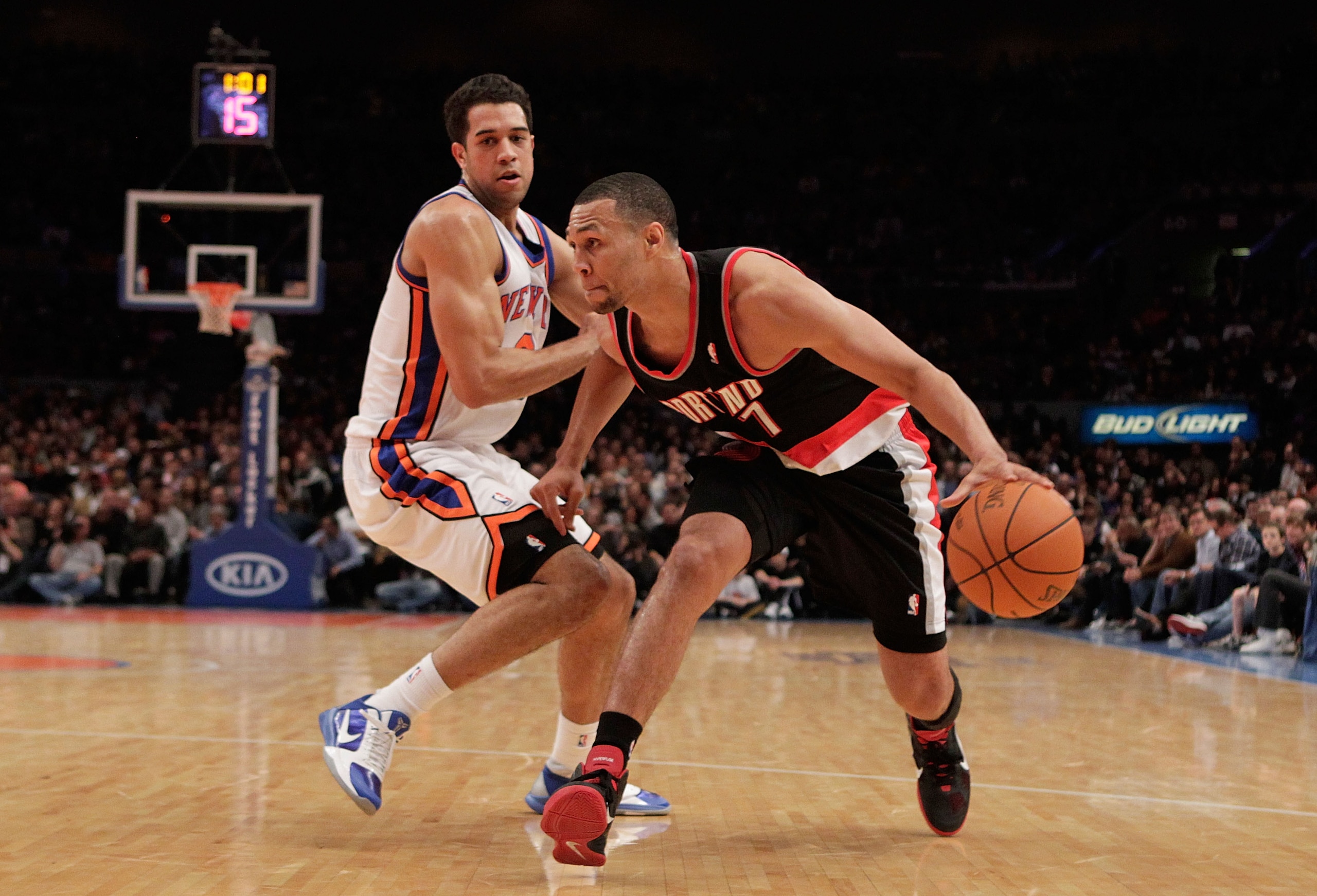 NEW YORK - OCTOBER 30:  Brandon Roy #7 of the Portland Trail Blazer drives the ball past Landry Fields #6 of the New York Knicks at Madison Square Garden on October 30, 2010 in New York City. NOTE TO USER: User expressly acknowledges and agrees that, by d