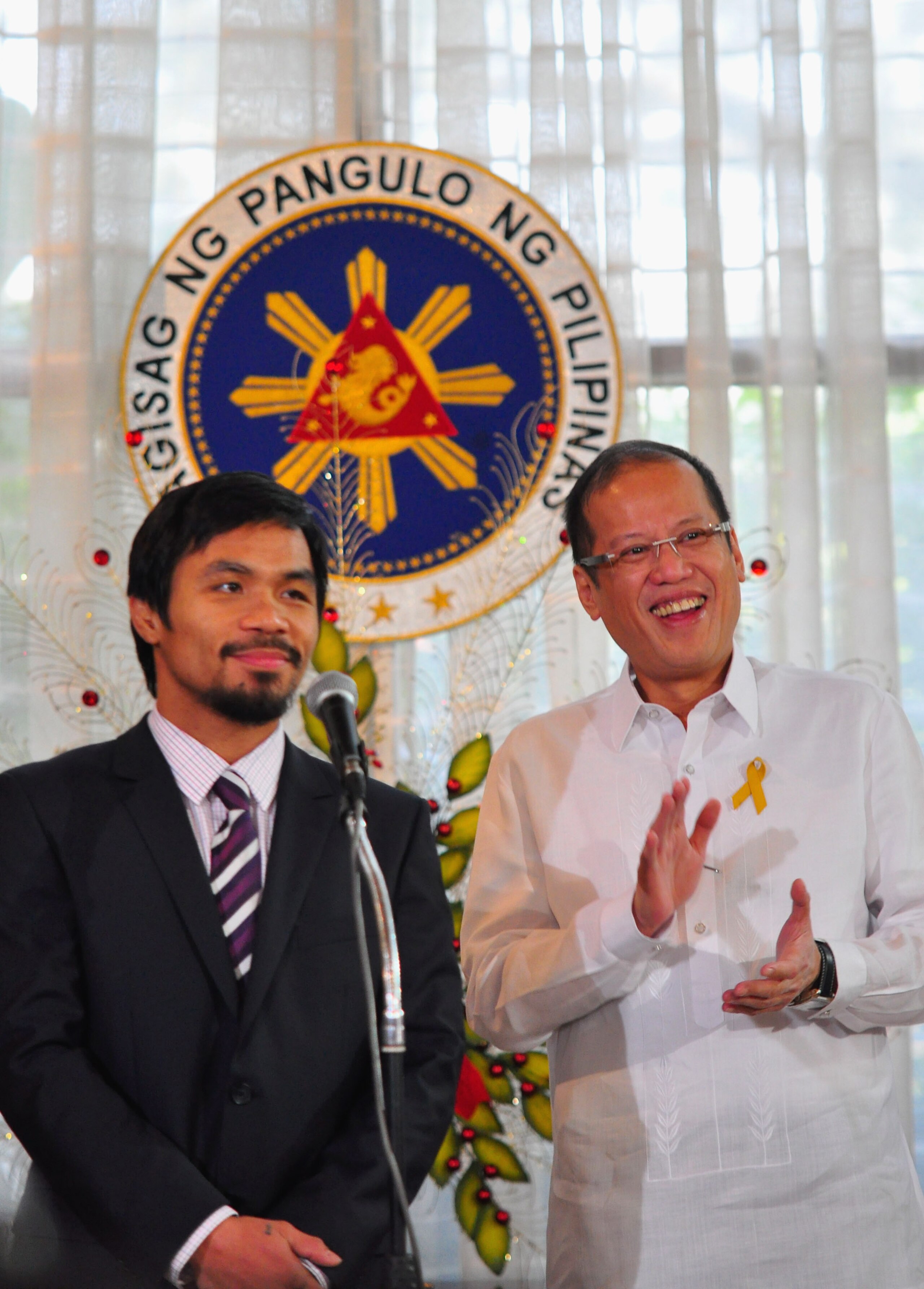 MANILA, PHILIPPINES - NOVEMBER 20:  Philippine President Benigno Aquinoo III addresses the audience at Malacanang Palace in Manila following Manny Pacquiao's win in the WBC super welterweight crown against Mexican Antonio Margarito on November 20, 2010 in