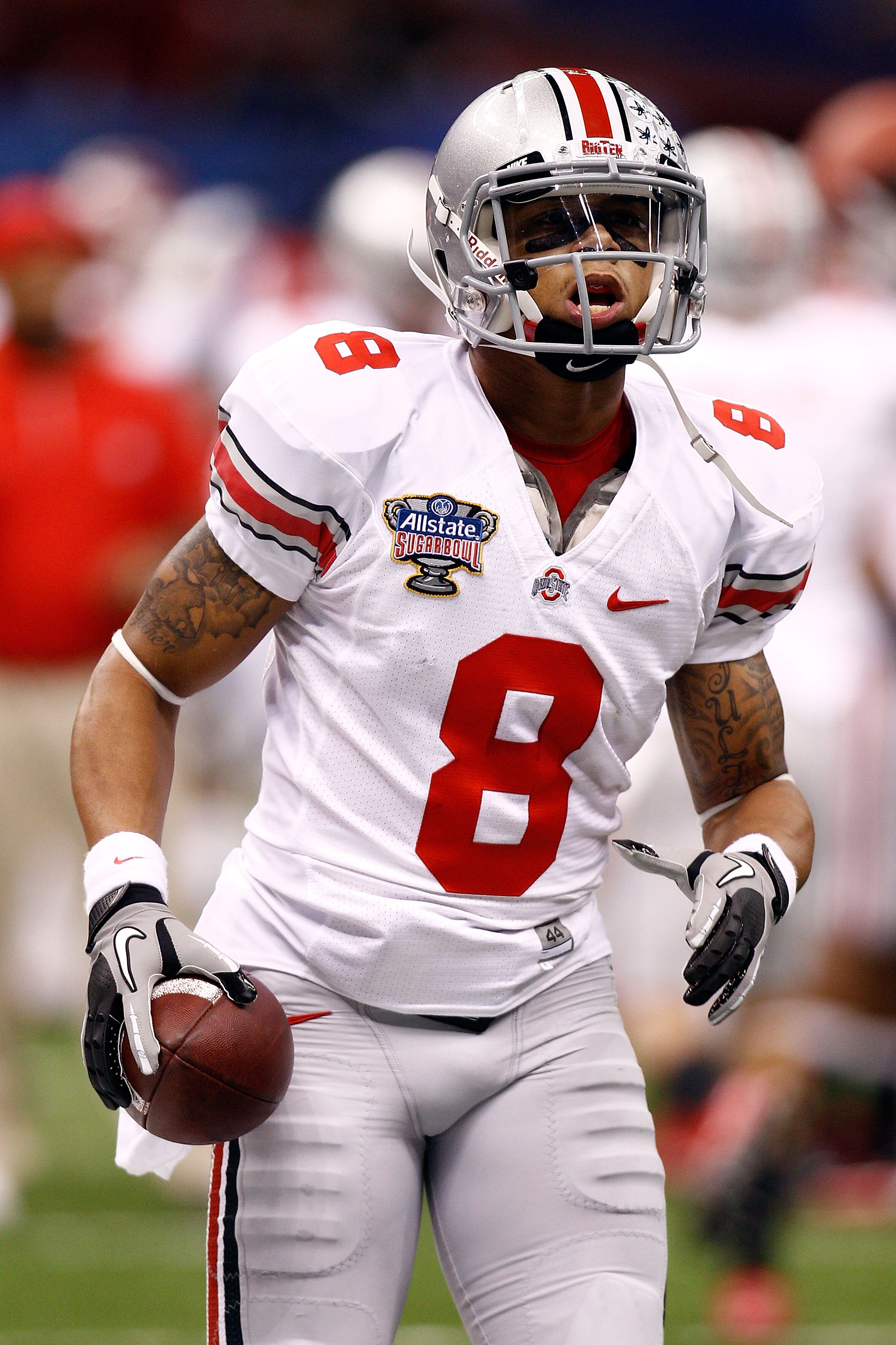 NEW ORLEANS, LA - JANUARY 04:  DeVier Posey #8 of the Ohio State Buckeyes looks on before taking on the Arkansas Razorbacks in the Allstate Sugar Bowl at the Louisiana Superdome on January 4, 2011 in New Orleans, Louisiana.  (Photo by Chris Graythen/Getty