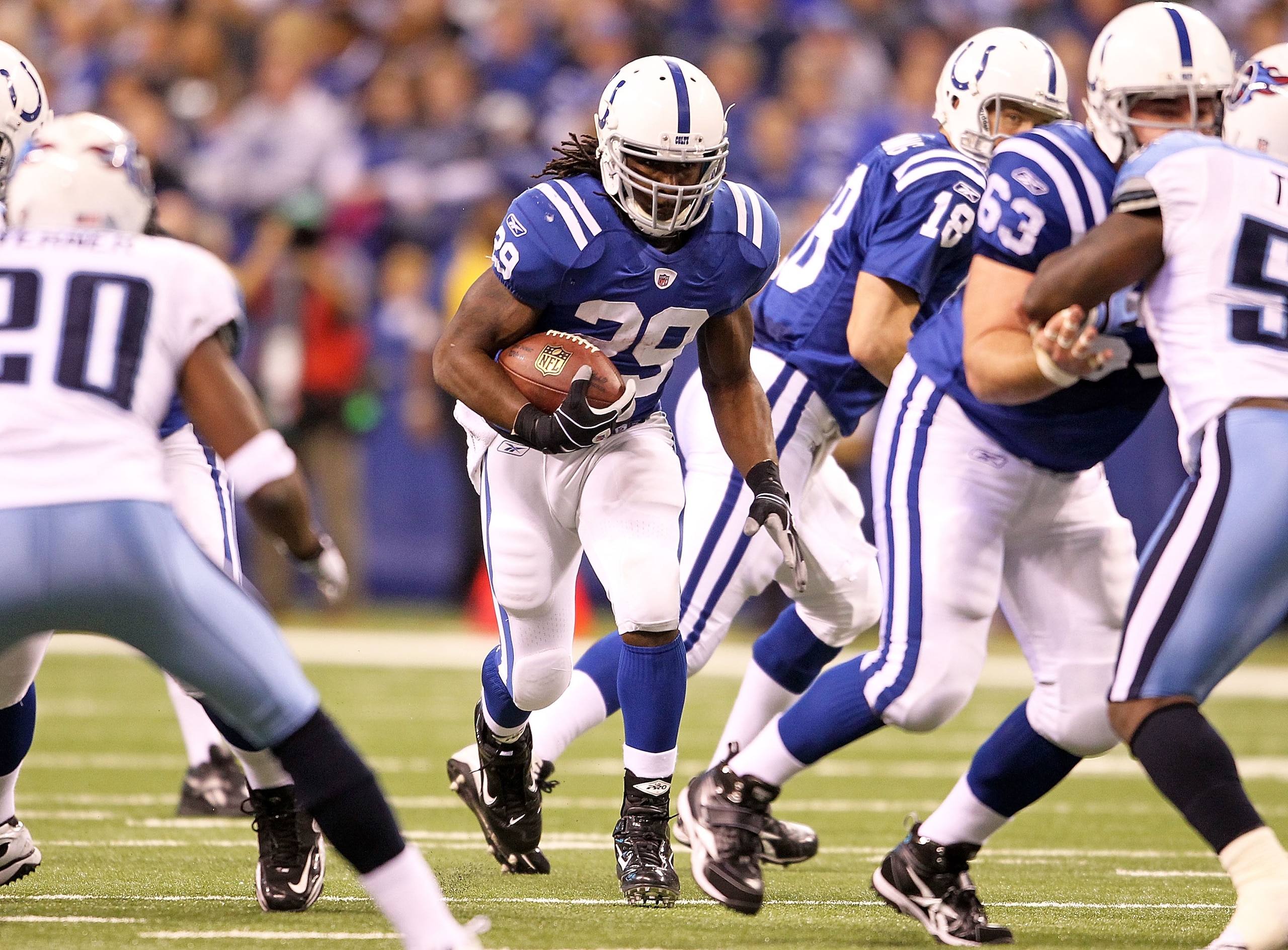 INDIANAPOLIS - JANUARY 02:  Joseph Addai  #29 of the Indianapolis Colts runs with the ball during NFL game against the Tennessee Titans at Lucas Oil Stadium on January 2, 2011 in Indianapolis, Indiana.  (Photo by Andy Lyons/Getty Images)