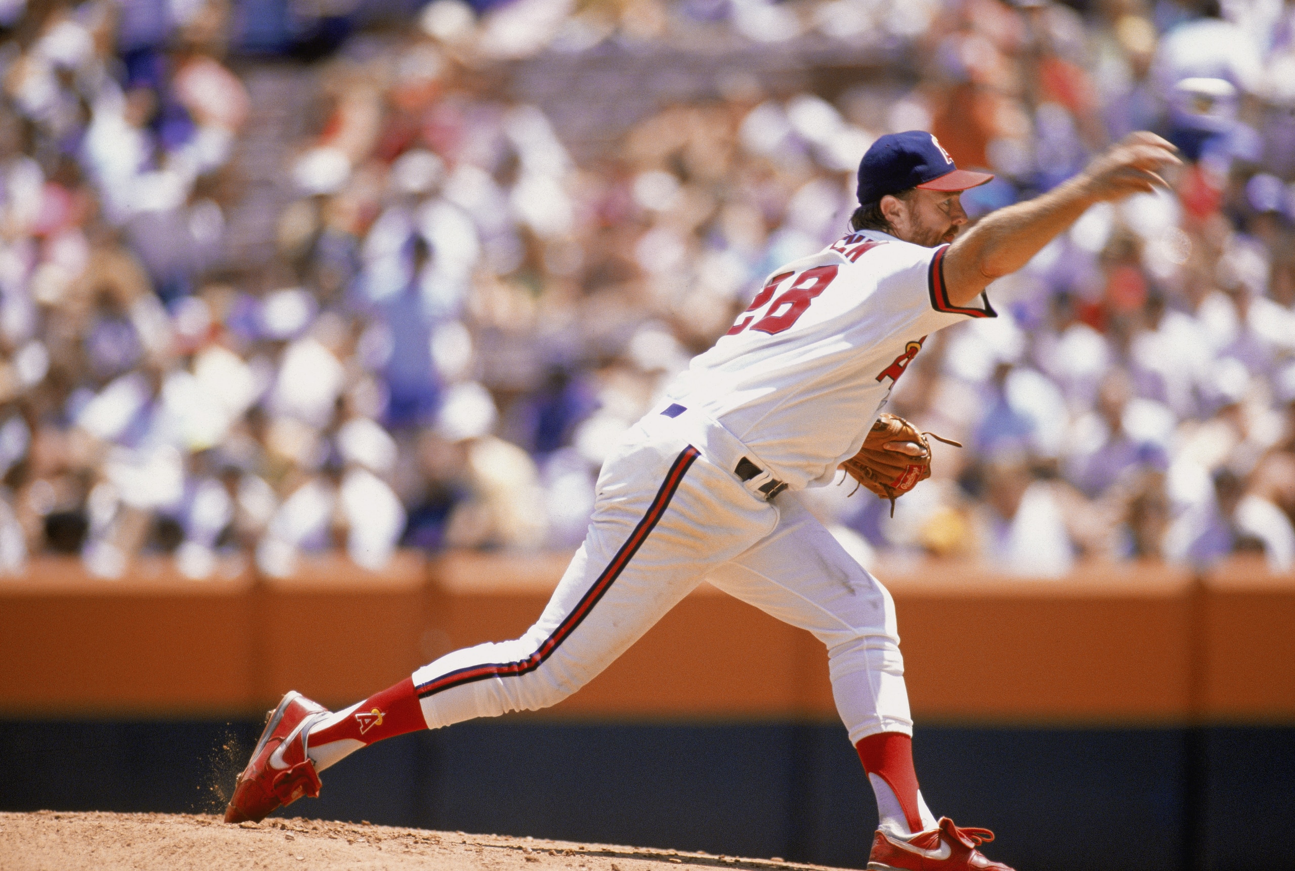 ANAHEIM, CA 1989:  Pitcher Bert Blyleven #28 of the California Angels delivers the pitch during a game at Anaheim Stadium in Anaheim, California.  (Photo by Mike Powell/Getty Images)