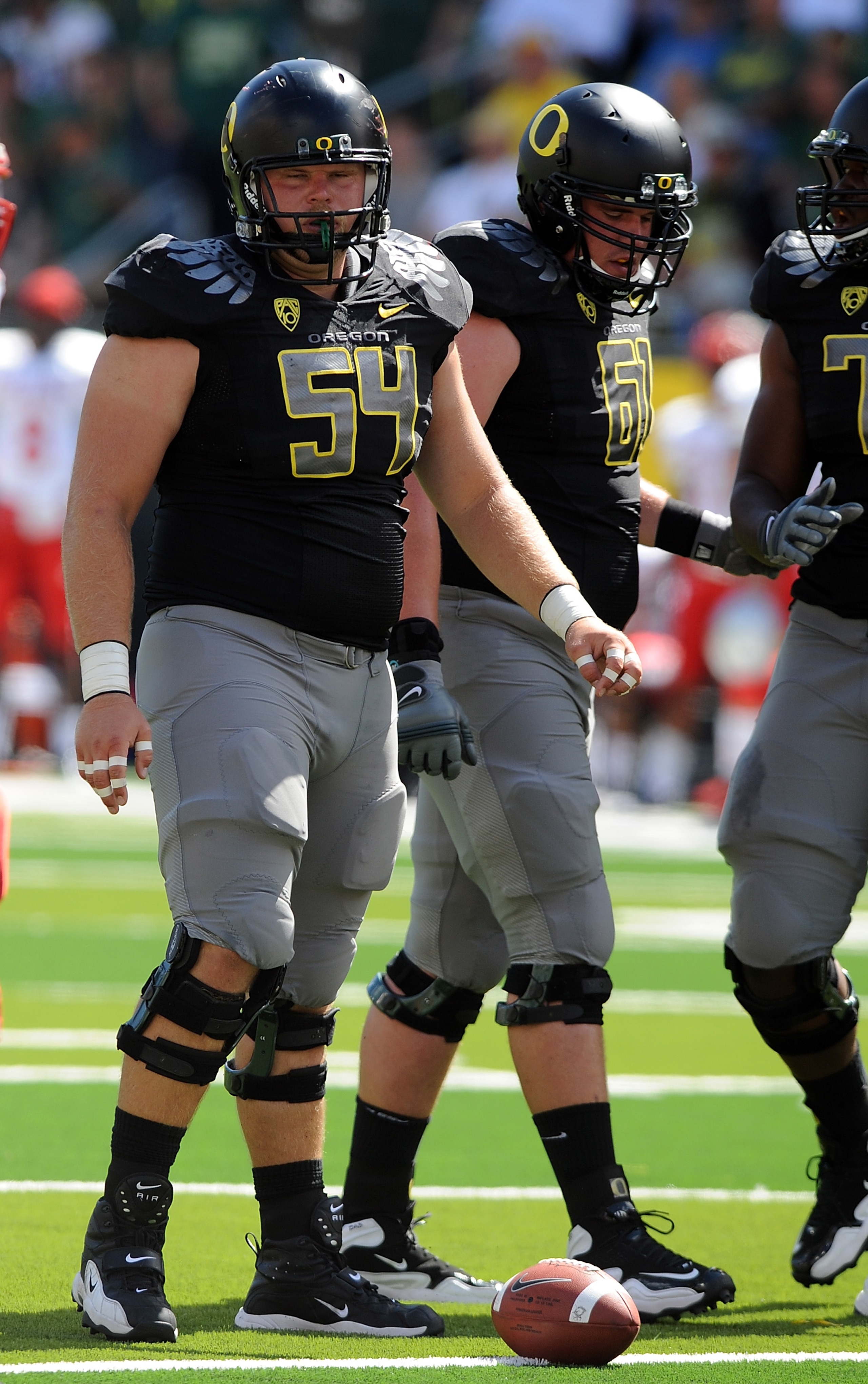 EUGENE, OR - SEPTEMBER 04:  Center Jordan Holmes #54 of the Oregon Ducks gets set at the line of scrimmage in the second quarter of the game against the New Mexico Lobos at Autzen Stadium on September 4, 2010 in Eugene, Oregon. Oregon won the game 72-0. (