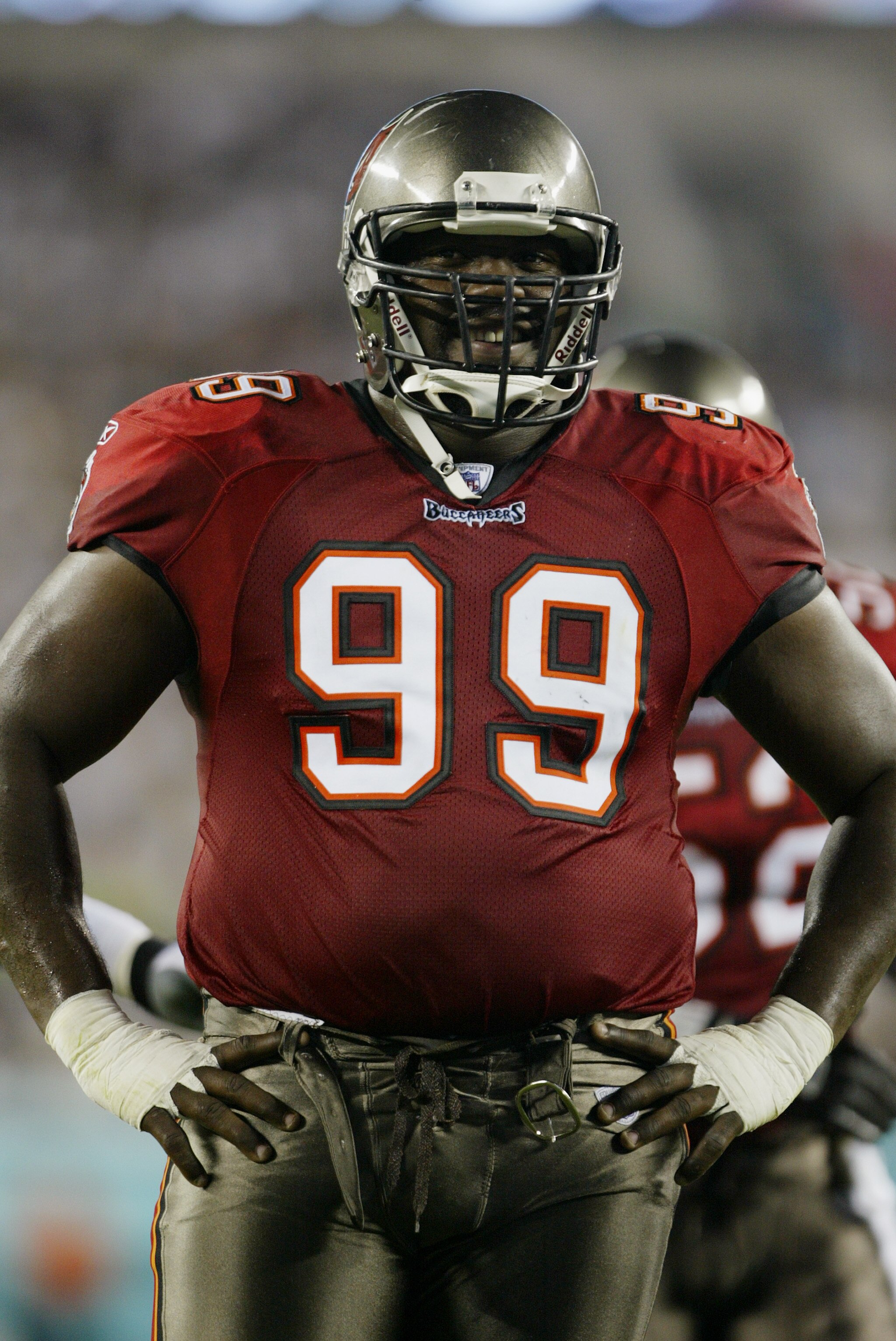 PHILADELPHIA - SEPTEMBER 8:  Warren Sapp #99 of the Tampa Bay Buccaneers smiles during the game against the Philadelphia Eagles on September 8, 2003 at Lincoln Financial Field in Philadelphia, Pennsylvania.  The Buccaneers defeated the Eagles 17-0 in the