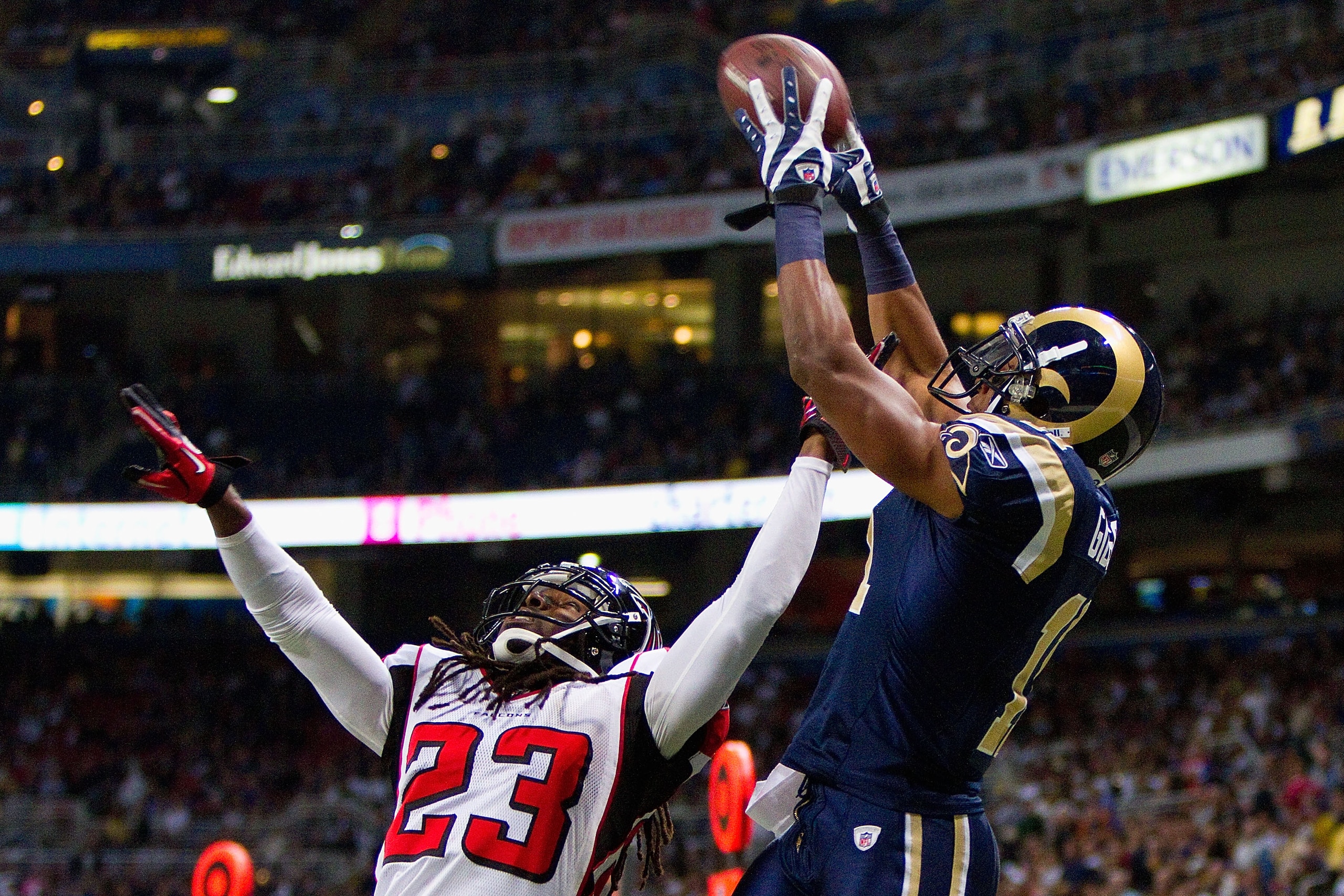 ST. LOUIS - NOVEMBER 21: Brandon Gibson #11 of the St. Louis Rams catches a touchdown pass against Dunta Robinson #23 of the Atlanta Falcons at the Edward Jones Dome on November 21, 2010 in St. Louis, Missouri.  The Falcons beat the Rams 34-17.  (Photo by