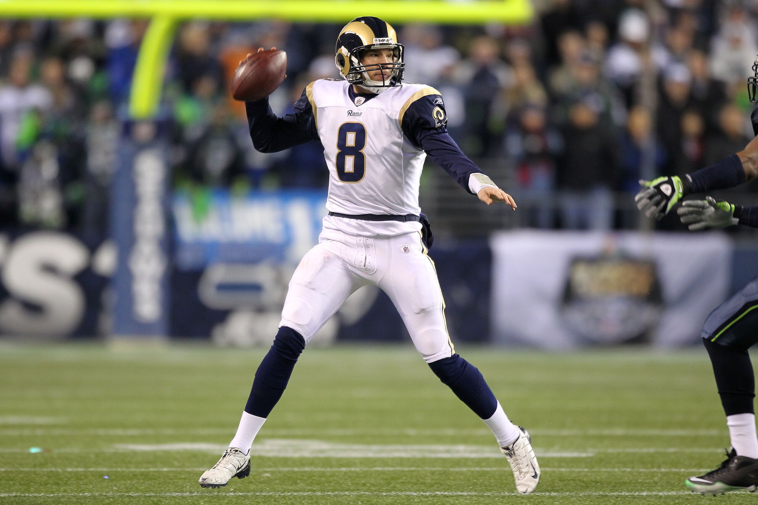 SEATTLE, WA - JANUARY 02: Quarterback Sam Bradford #8 of the St. Louis Rams looks to pass against the Seattle Seahawks during their game at Qwest Field on January 2, 2011 in Seattle, Washington. (Photo by Otto Greule Jr/Getty Images) SEATTLE, WA - JANUARY 02: Quarterback Sam Bradford #8 of the St. Louis Rams looks to pass against the Seattle Seahawks during their game at Qwest Field on January 2, 2011 in Seattle, Washington. (Photo by Otto Greule Jr/Getty Images)