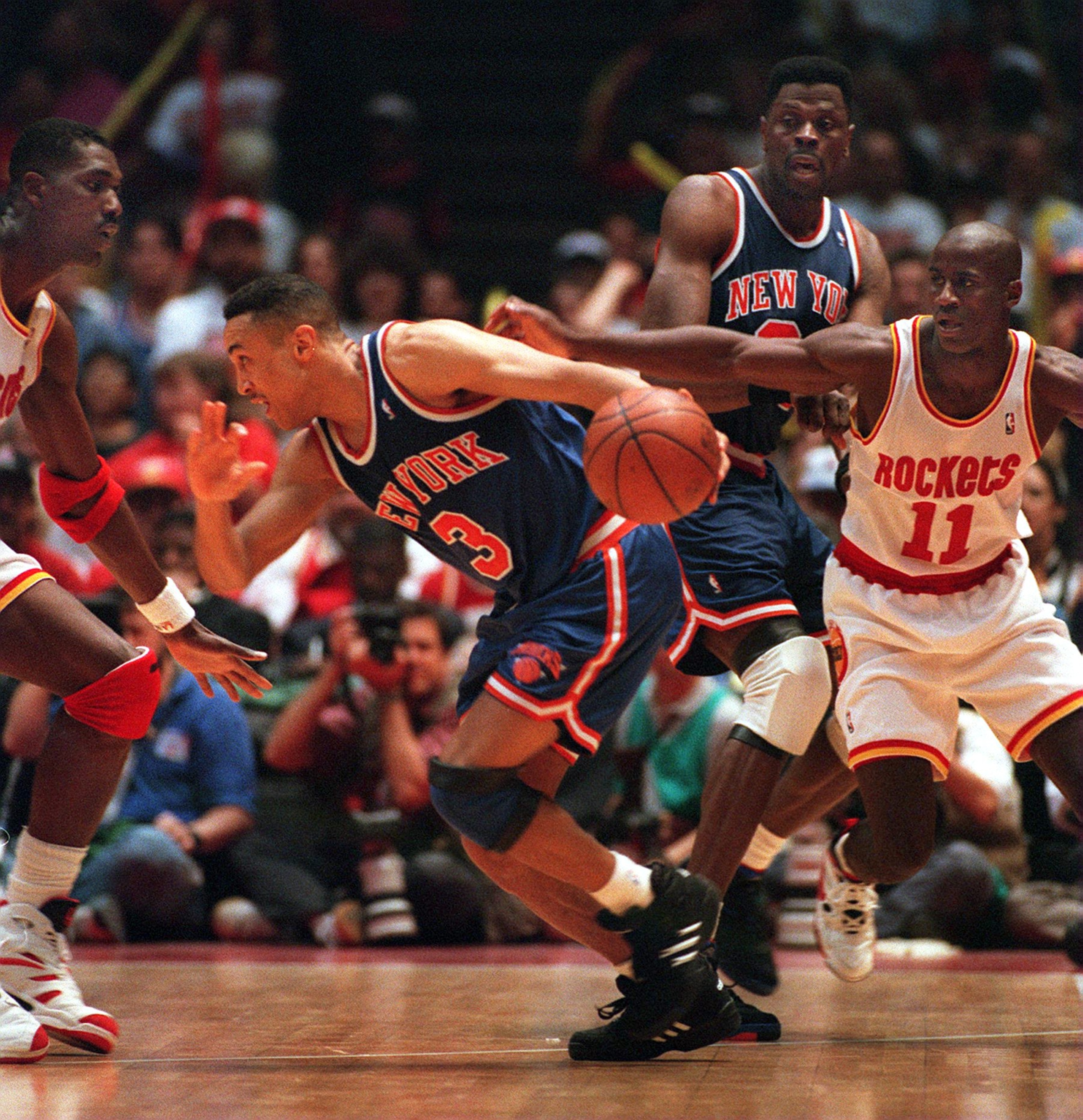 22 JUN 1994: NEW YORK KNICK JOHN STARKS #3, DRIBBLES AROUND HOUSTON ROCKET HAKEEM OLAJUWON (LEFT) AS ROCKET VERNON MAXWELL PURSUES DURING THE SECOND QUARTER OF GAME 7 IN THE NBA CHAMPIONSHIP AT THE SUMMIT IN HOUSTON. Mandatory Credit: Allsport/ALLSPORT 22 JUN 1994: NEW YORK KNICK JOHN STARKS #3, DRIBBLES AROUND HOUSTON ROCKET HAKEEM OLAJUWON (LEFT) AS ROCKET VERNON MAXWELL PURSUES DURING THE SECOND QUARTER OF GAME 7 IN THE NBA CHAMPIONSHIP AT THE SUMMIT IN HOUSTON. Mandatory Credit: Allsport/ALLSPORT