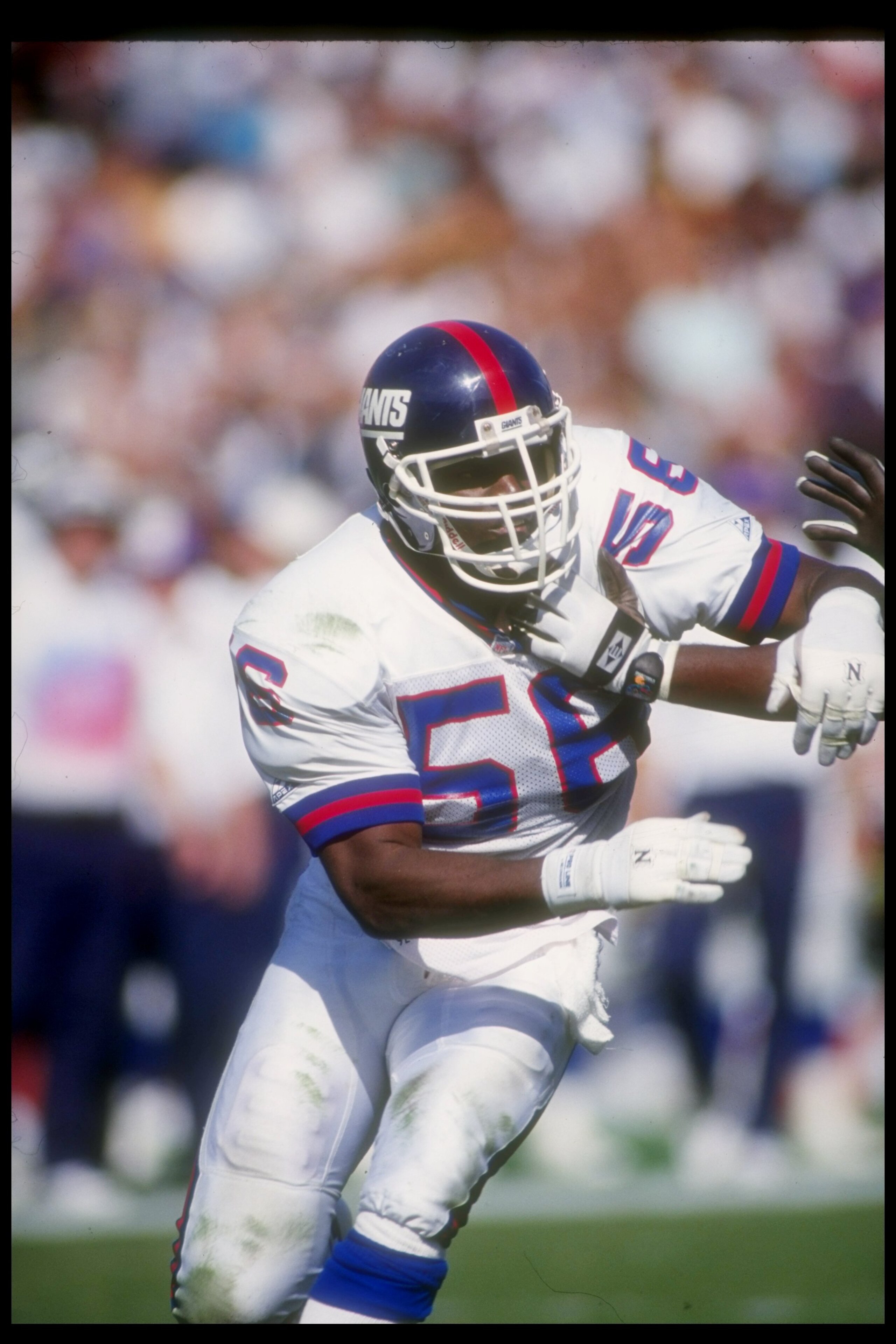 4 Oct 1992: Linebacker Lawrence Taylor of the New York Giants works against the Los Angeles Raiders during a game at the Los Angeles Memorial Coliseum in Los Angeles, California. The Raiders won the game, 13-10. Mandatory Credit: Ken Levine /Allsport 4 Oct 1992: Linebacker Lawrence Taylor of the New York Giants works against the Los Angeles Raiders during a game at the Los Angeles Memorial Coliseum in Los Angeles, California. The Raiders won the game, 13-10. Mandatory Credit: Ken Levine /Allsport