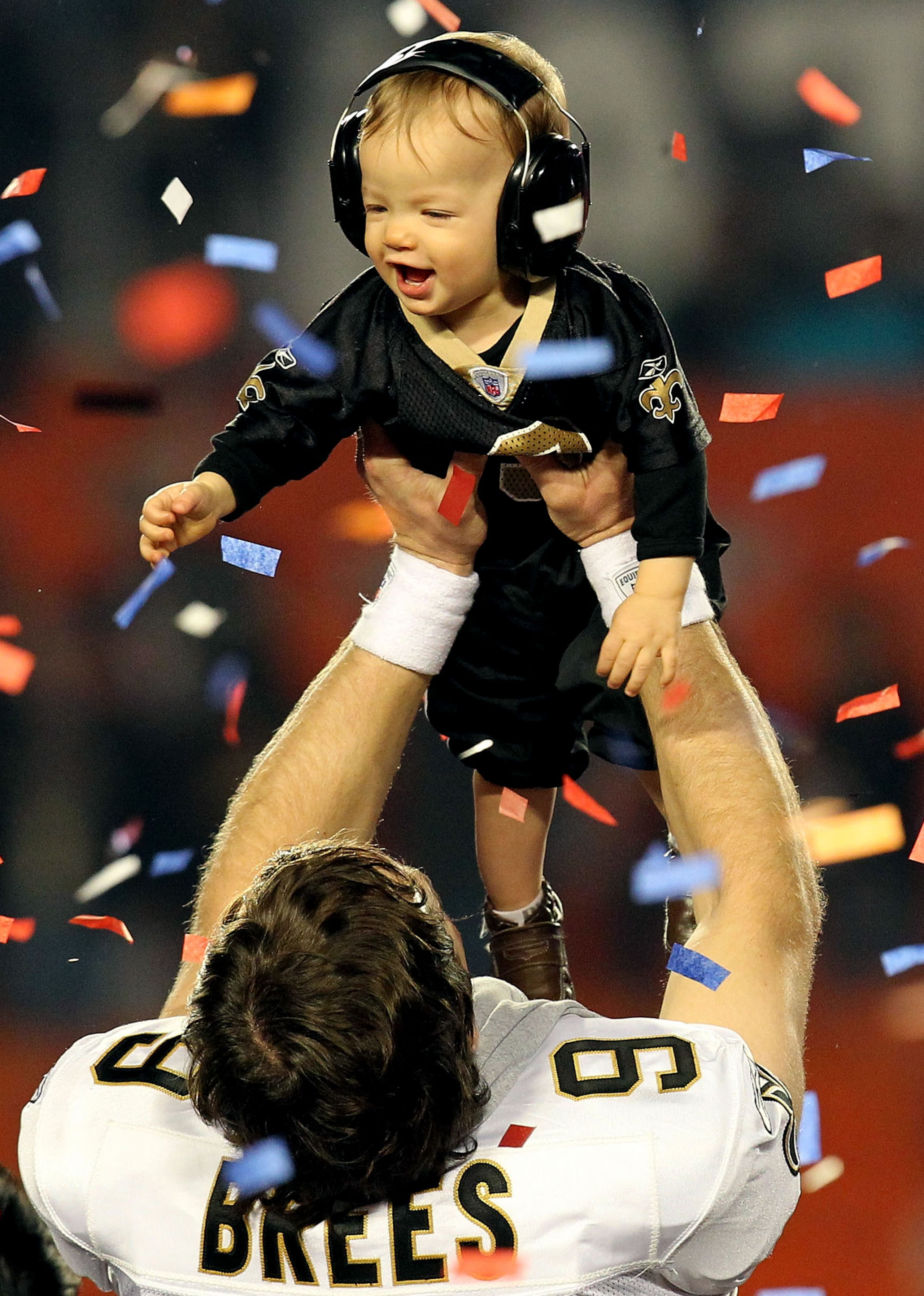 MIAMI GARDENS, FL - FEBRUARY 07:  Drew Brees #9 of the New Orleans Saints celebrates with his son Baylen Brees after defeating the Indianapolis Colts during Super Bowl XLIV on February 7, 2010 at Sun Life Stadium in Miami Gardens, Florida.  (Photo by Rona