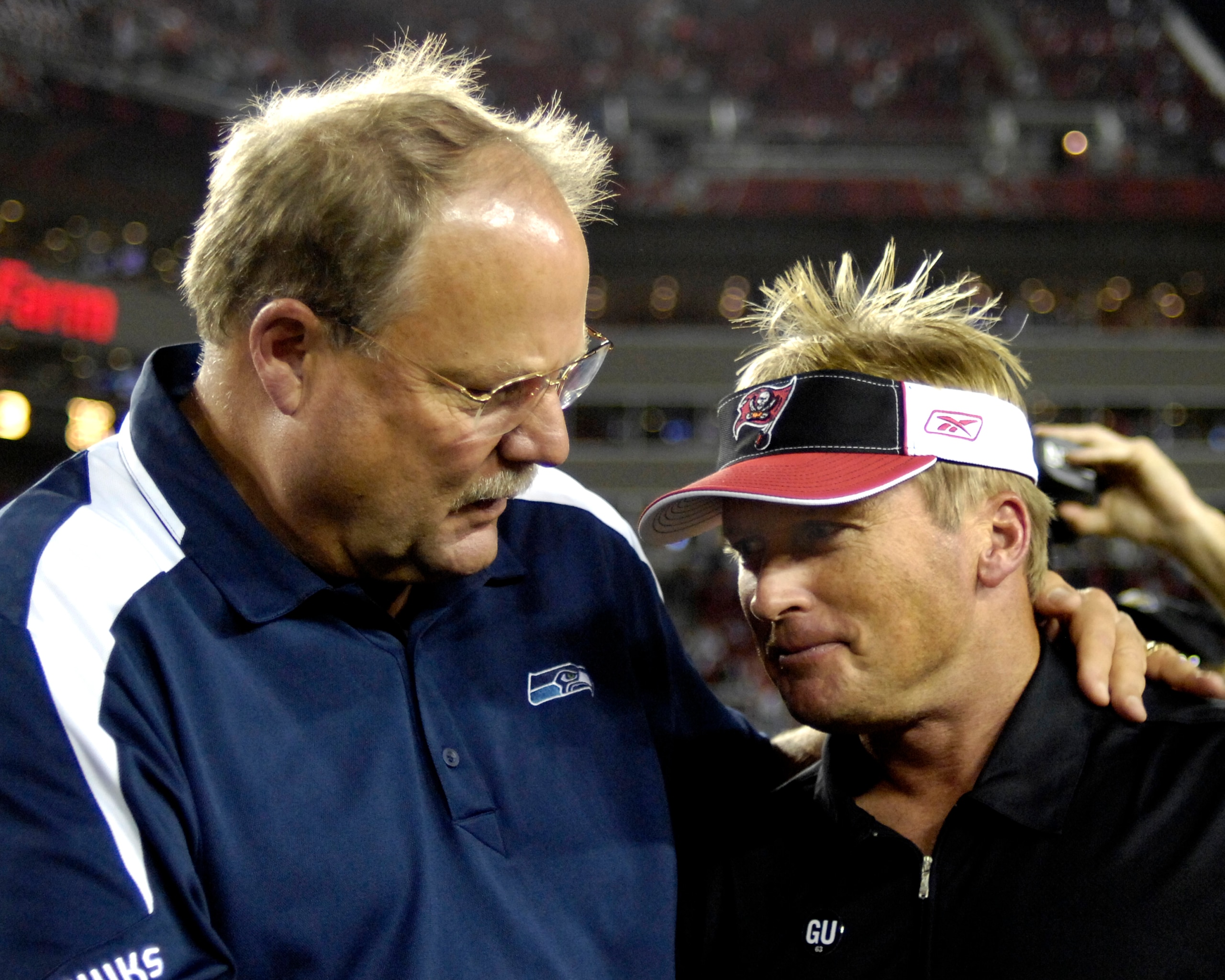 TAMPA, FL - OCTOBER 19: Coach Mike Holmgren of the Seattle Seahawks hugs coach Jon Gruden of the Tampa Bay Buccaneers after play at Raymond James Stadium on October 19, 2008 in Tampa, Florida. (Photo by Al Messerschmidt/Getty Images) TAMPA, FL - OCTOBER 19: Coach Mike Holmgren of the Seattle Seahawks hugs coach Jon Gruden of the Tampa Bay Buccaneers after play at Raymond James Stadium on October 19, 2008 in Tampa, Florida. (Photo by Al Messerschmidt/Getty Images)