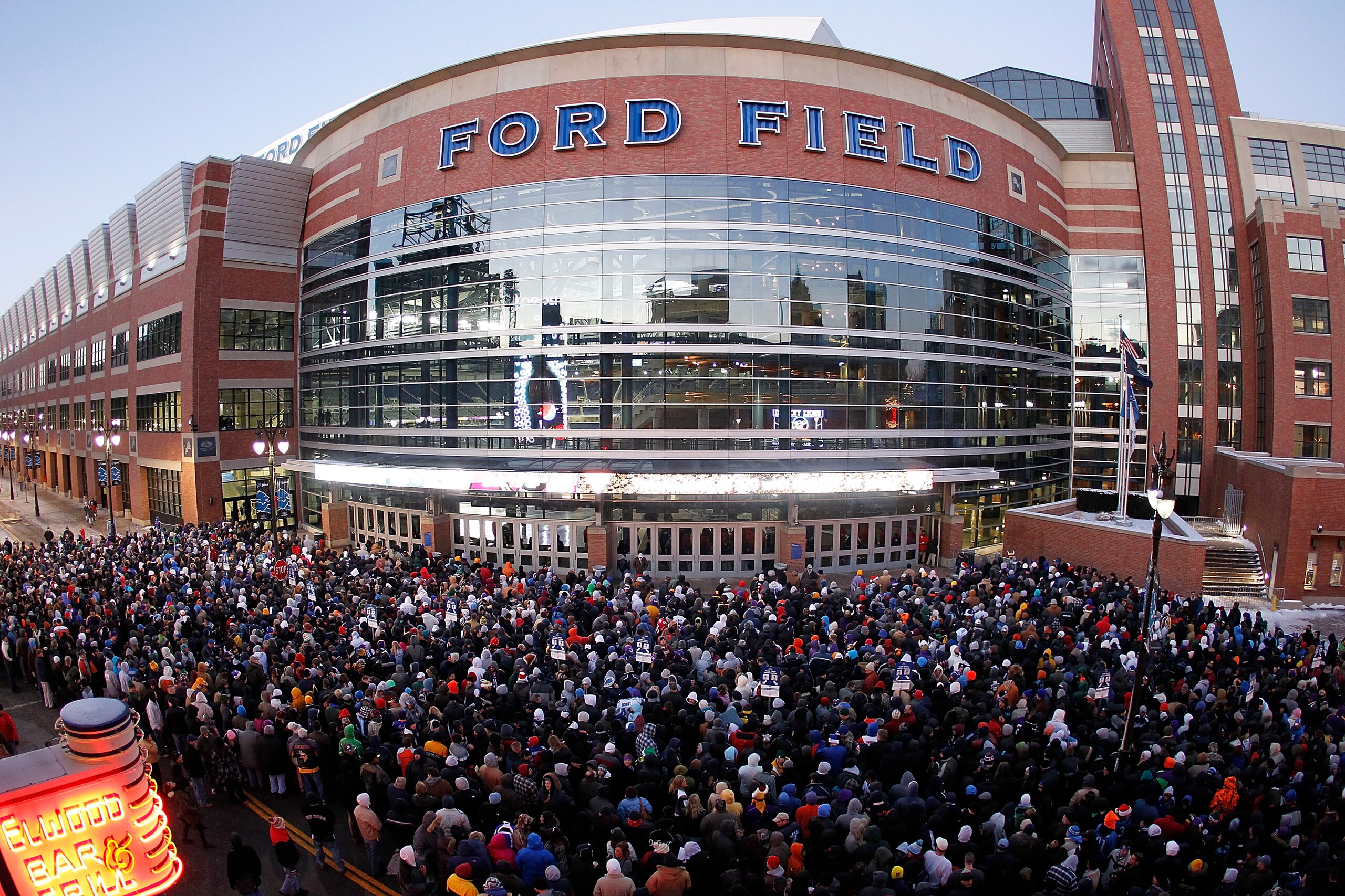 DETROIT, MI - DECEMBER 13: Football fans line up at Ford Field to enter the game between the New York Giants and the Minnesota Vikings on December 13, 2010 in Detroit, Michigan. (Photo by Leon Halip/Getty Images)